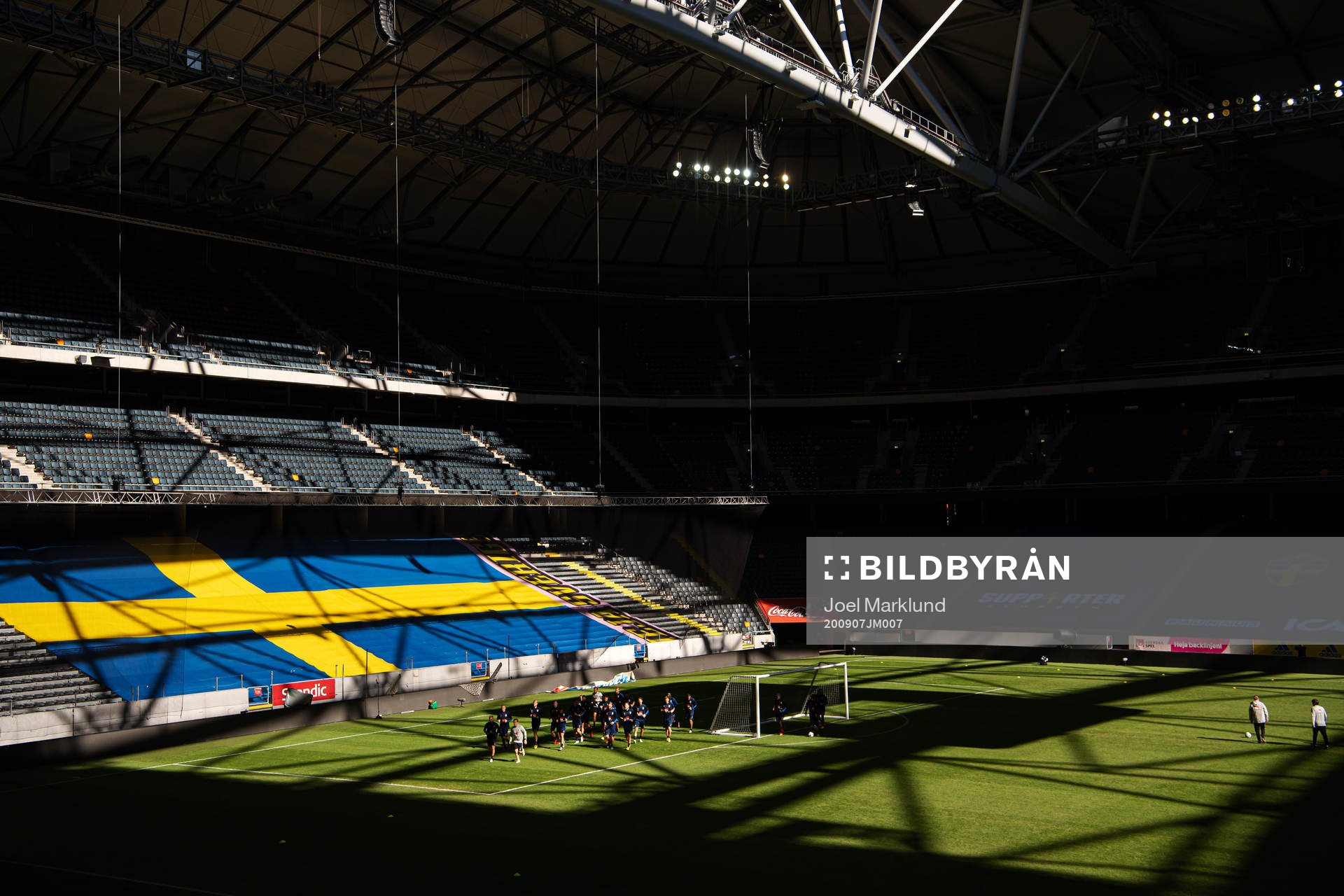 Players of the Swedish national football team warm up