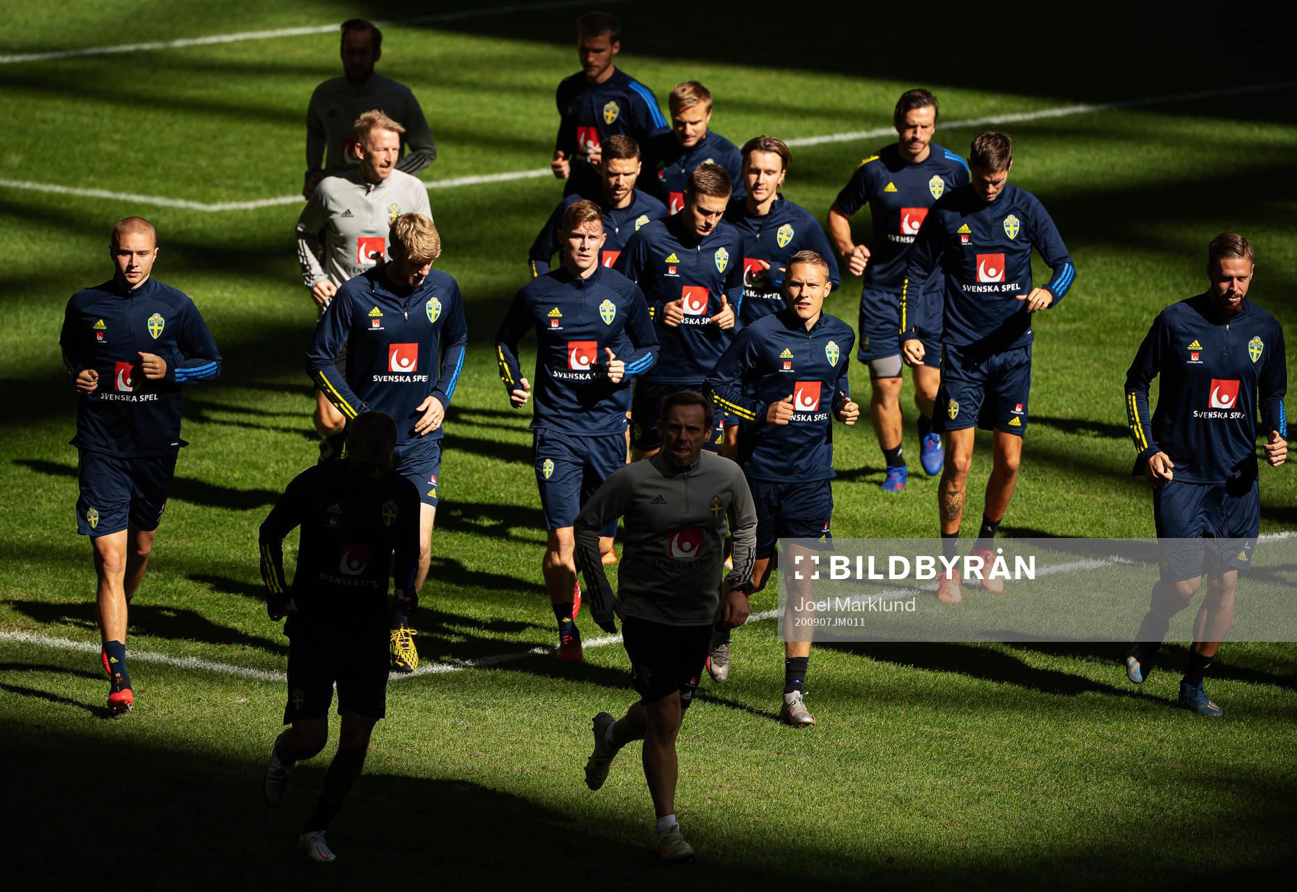 Players of the Swedish national football team warm up