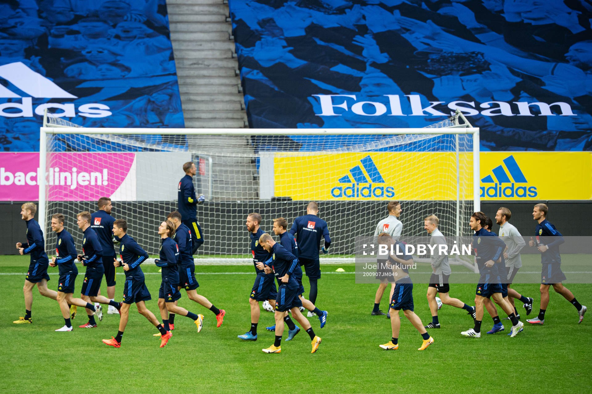 Players of the Swedish national football team warming up