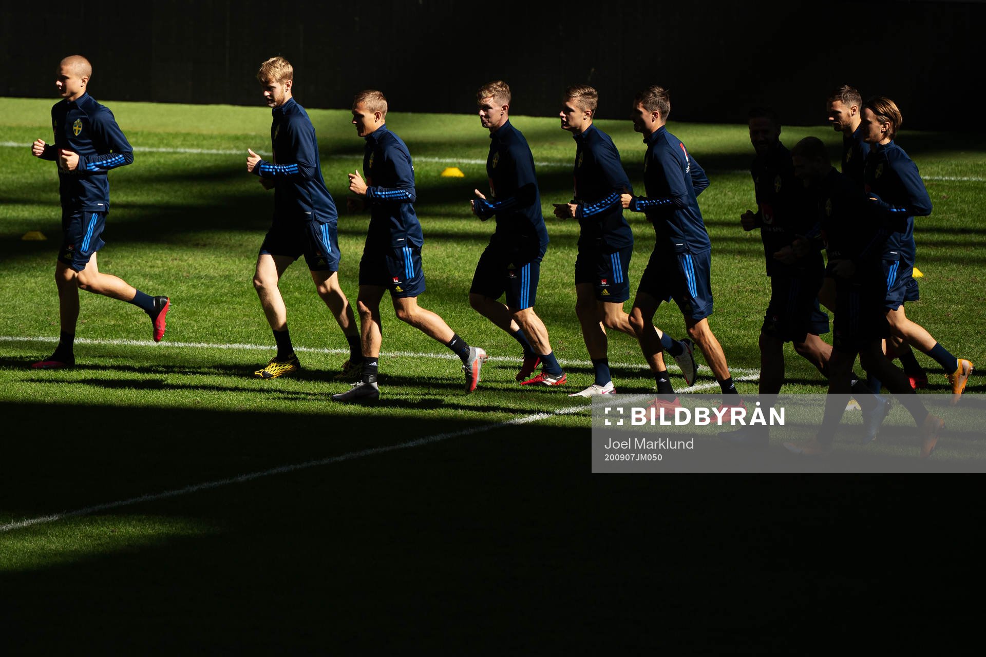 Players of the Swedish national football team warming up