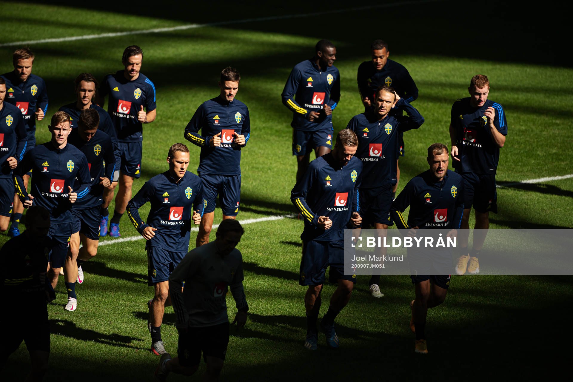 Players of the Swedish national football team warming up