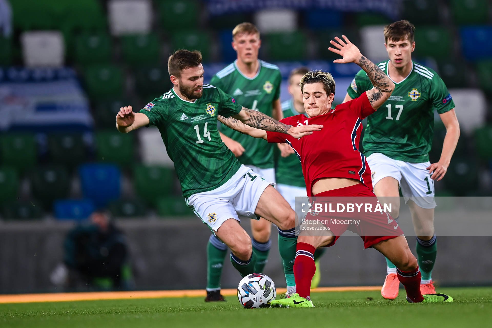 Stuart Dallas of Northern Ireland and Mathias Normann of
