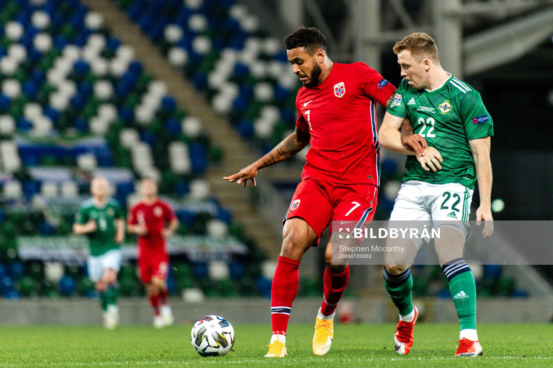 Joshua King of Norway and Shayne Lavery of Northern Ireland