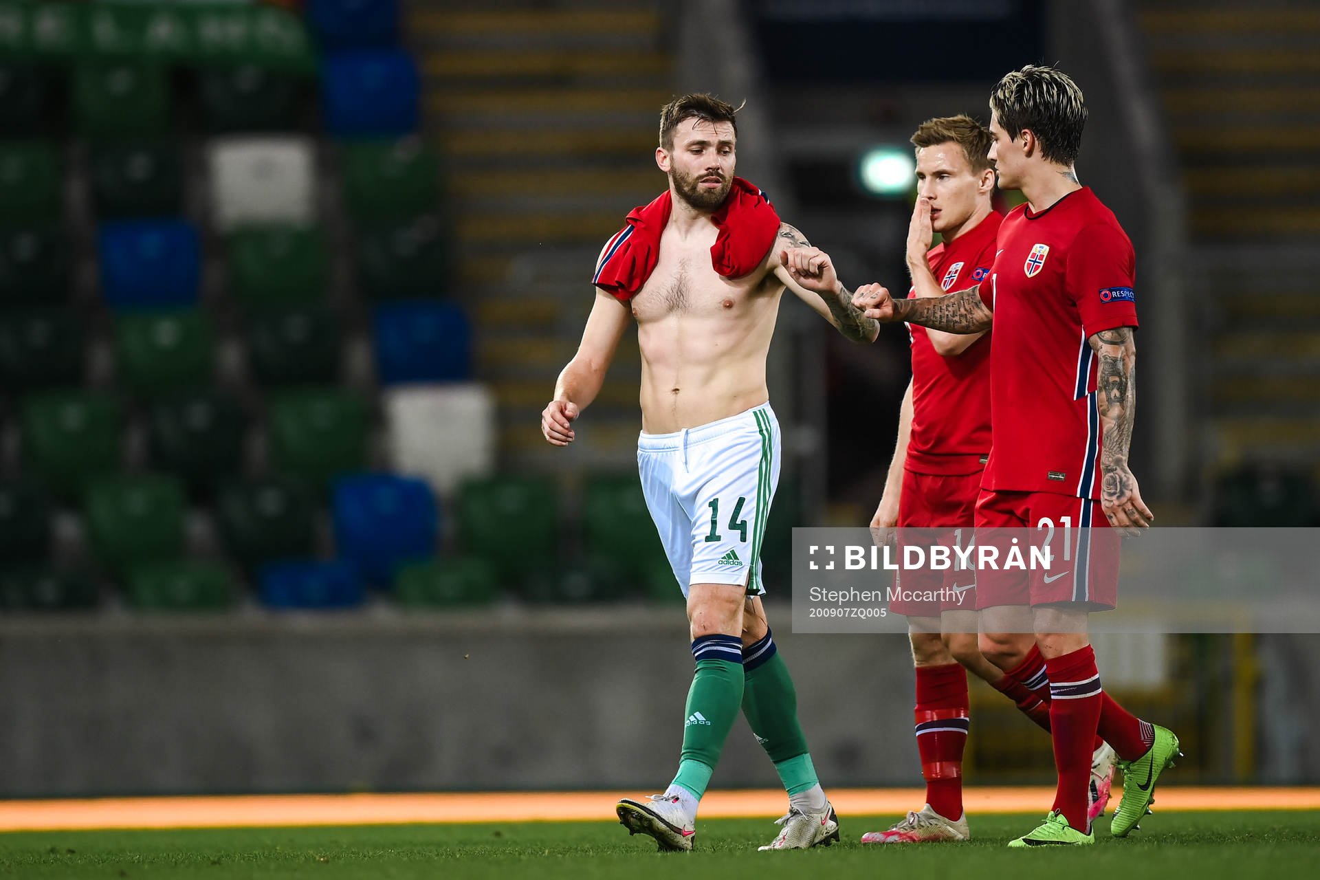 Stuart Dallas of Northern Ireland with Jonas Svensson and