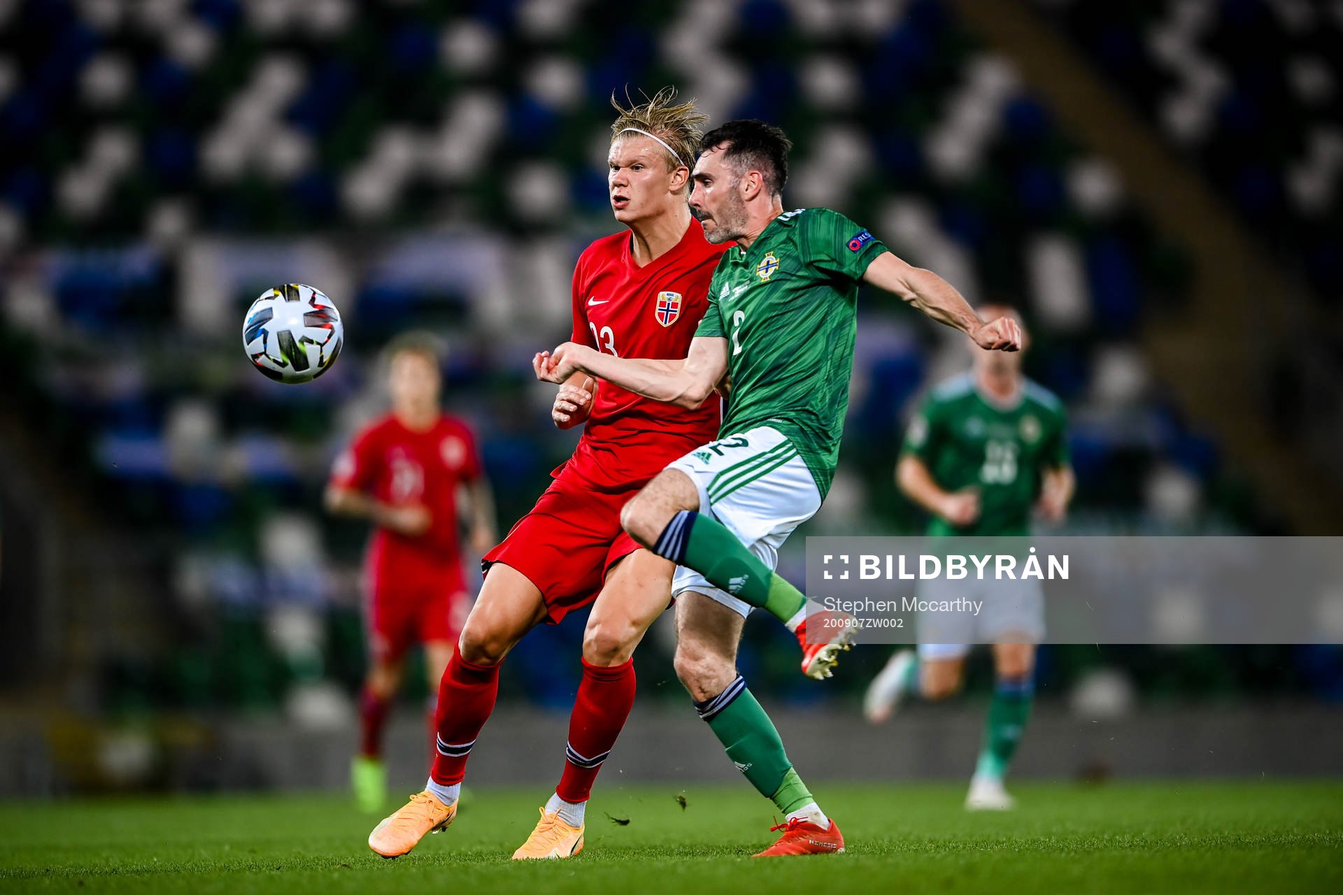 Erling Braut Haaland of Norway and Michael Smith orthern