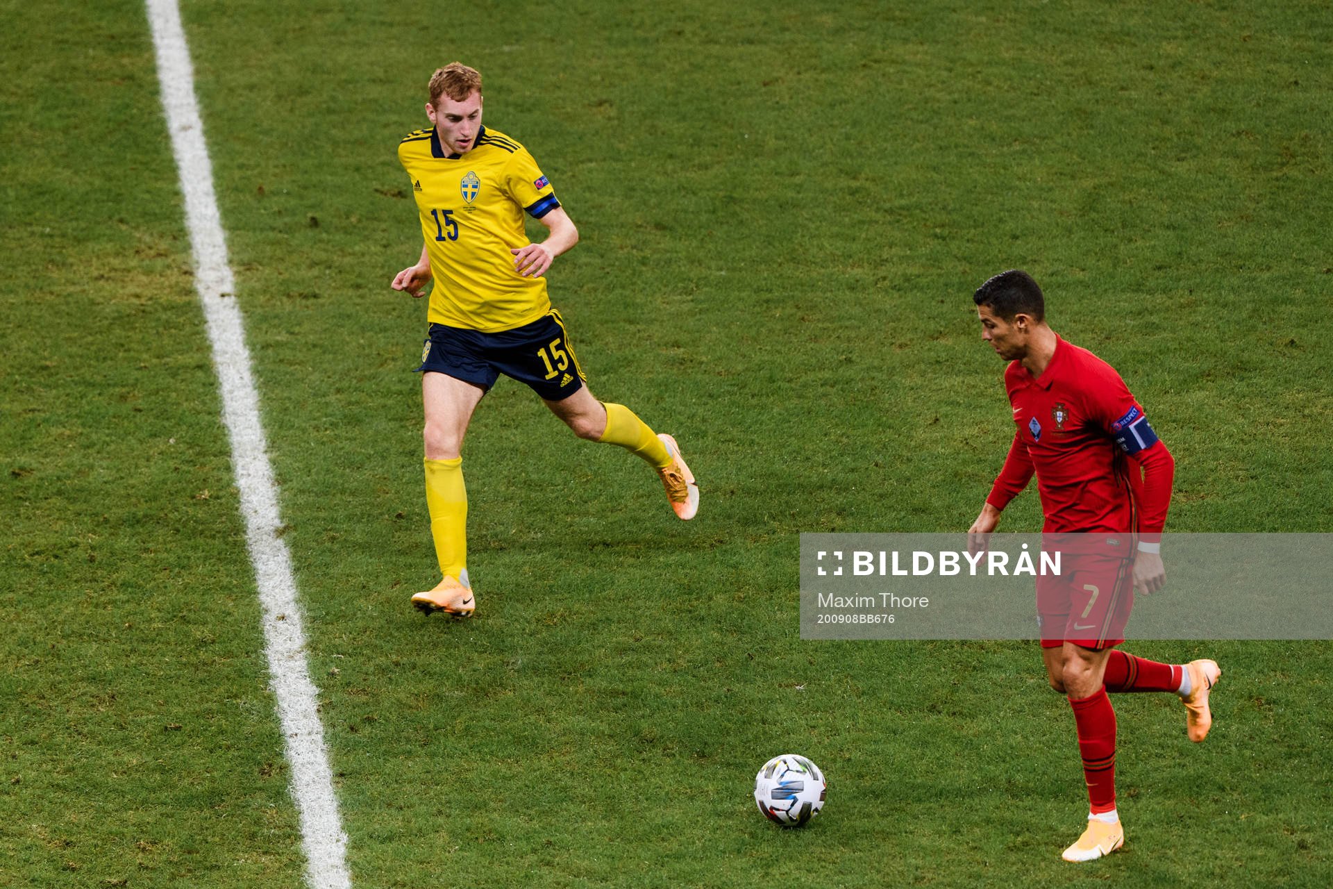 Dejan Kulusevski of Sweden and Cristiano Ronaldo of Portugal