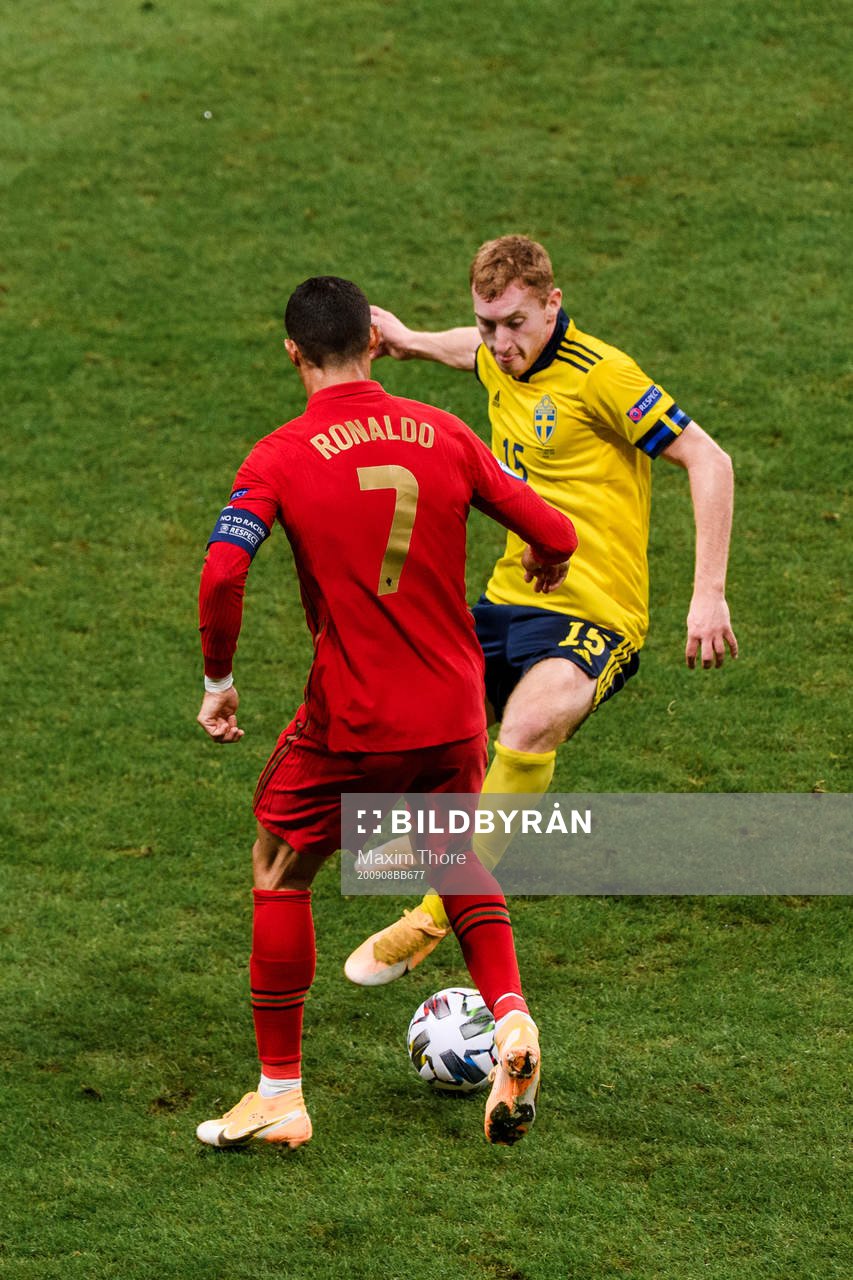 Dejan Kulusevski of Sweden and Cristiano Ronaldo of Portugal