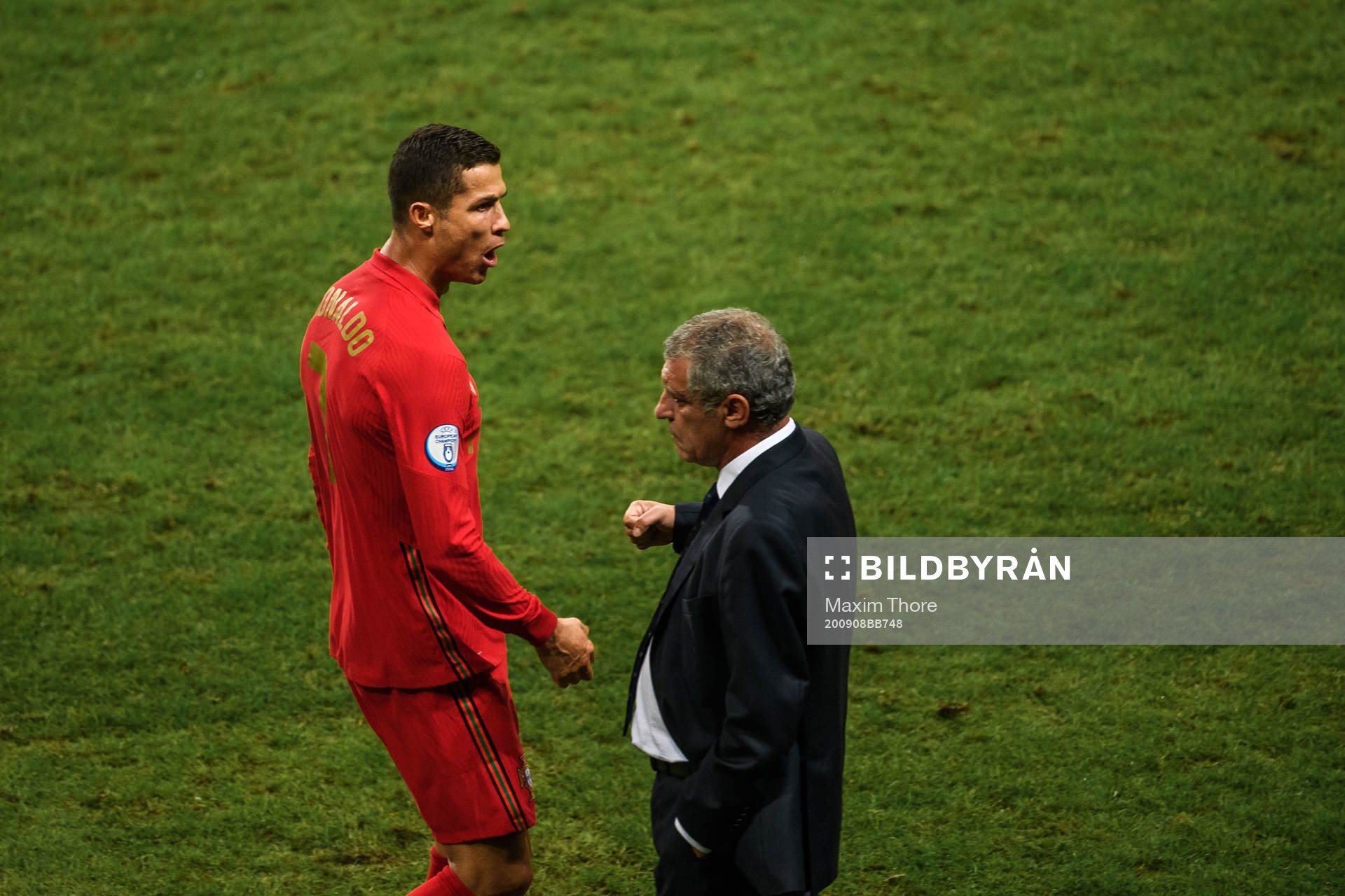 Cristiano Ronaldo of Portugal celebrate with head coach
