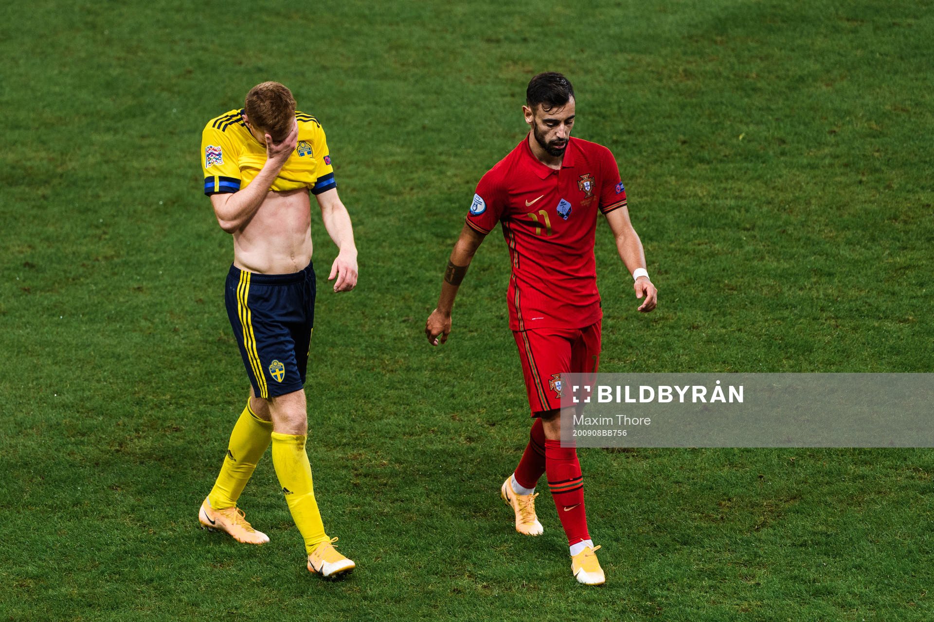 Dejan Kulusevski of Sweden and Bruno Fernandes of Portugal