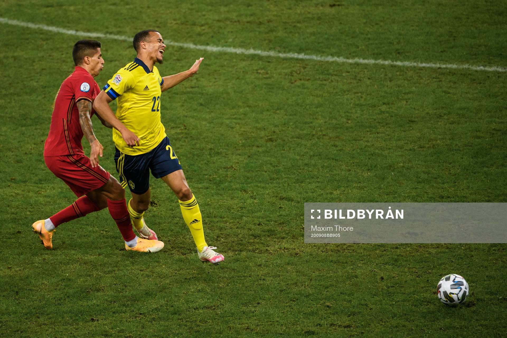 Joao Cancelo of Portugal and Robin Quaison of Sweden