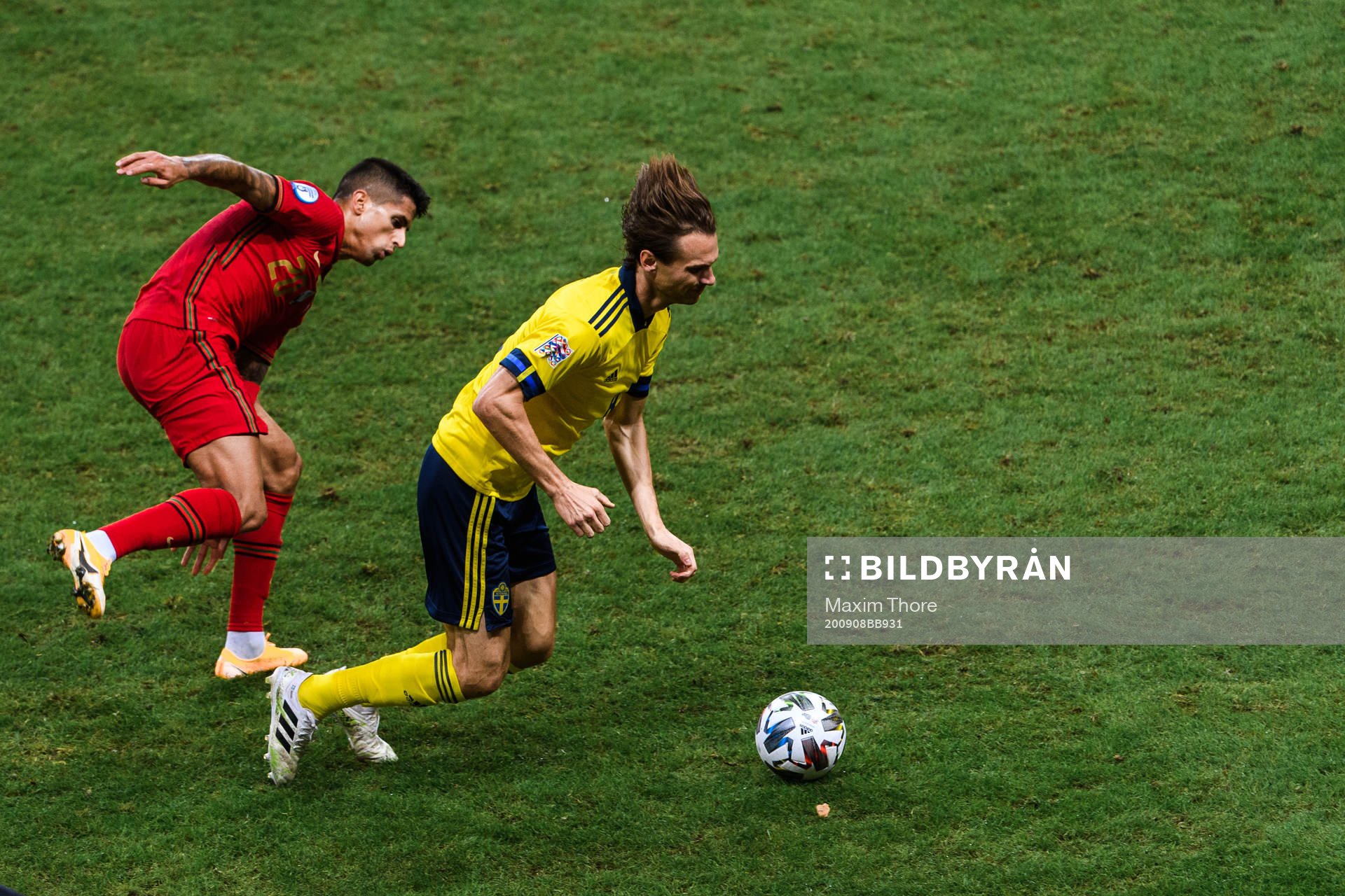 Joao Cancelo of Portugal and Albin Ekdal of Sweden