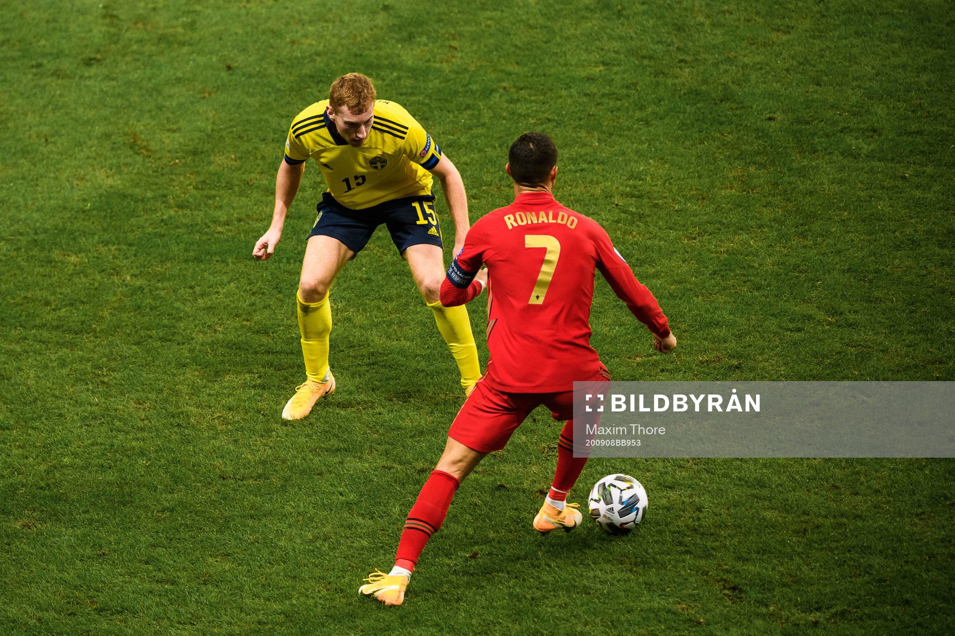 Dejan Kulusevski of Sweden and Cristiano Ronaldo of Portugal