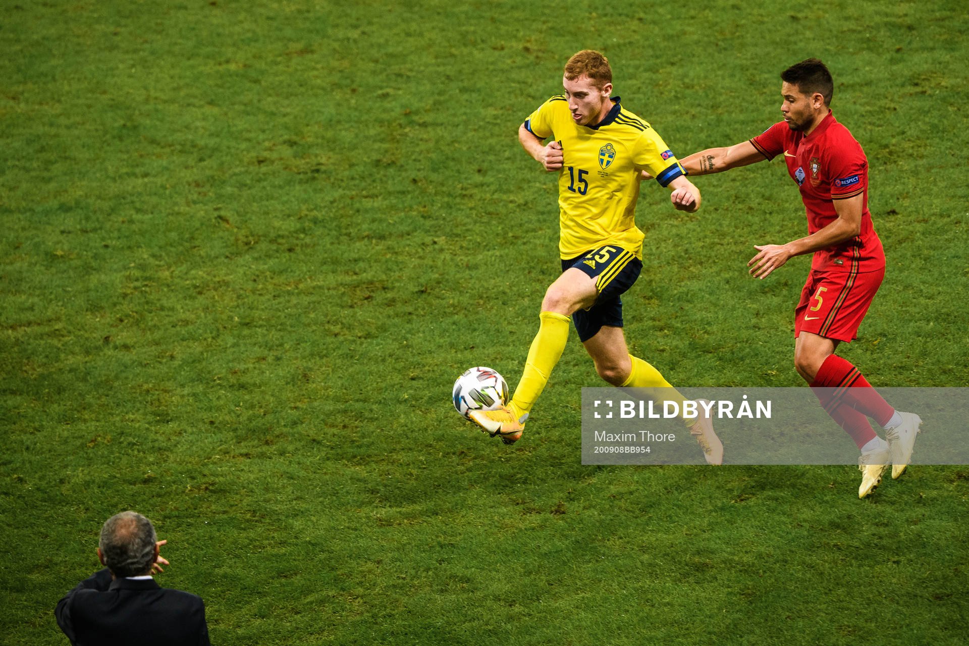 Dejan Kulusevski of Sweden and Raphael Guerreiro of Portugal