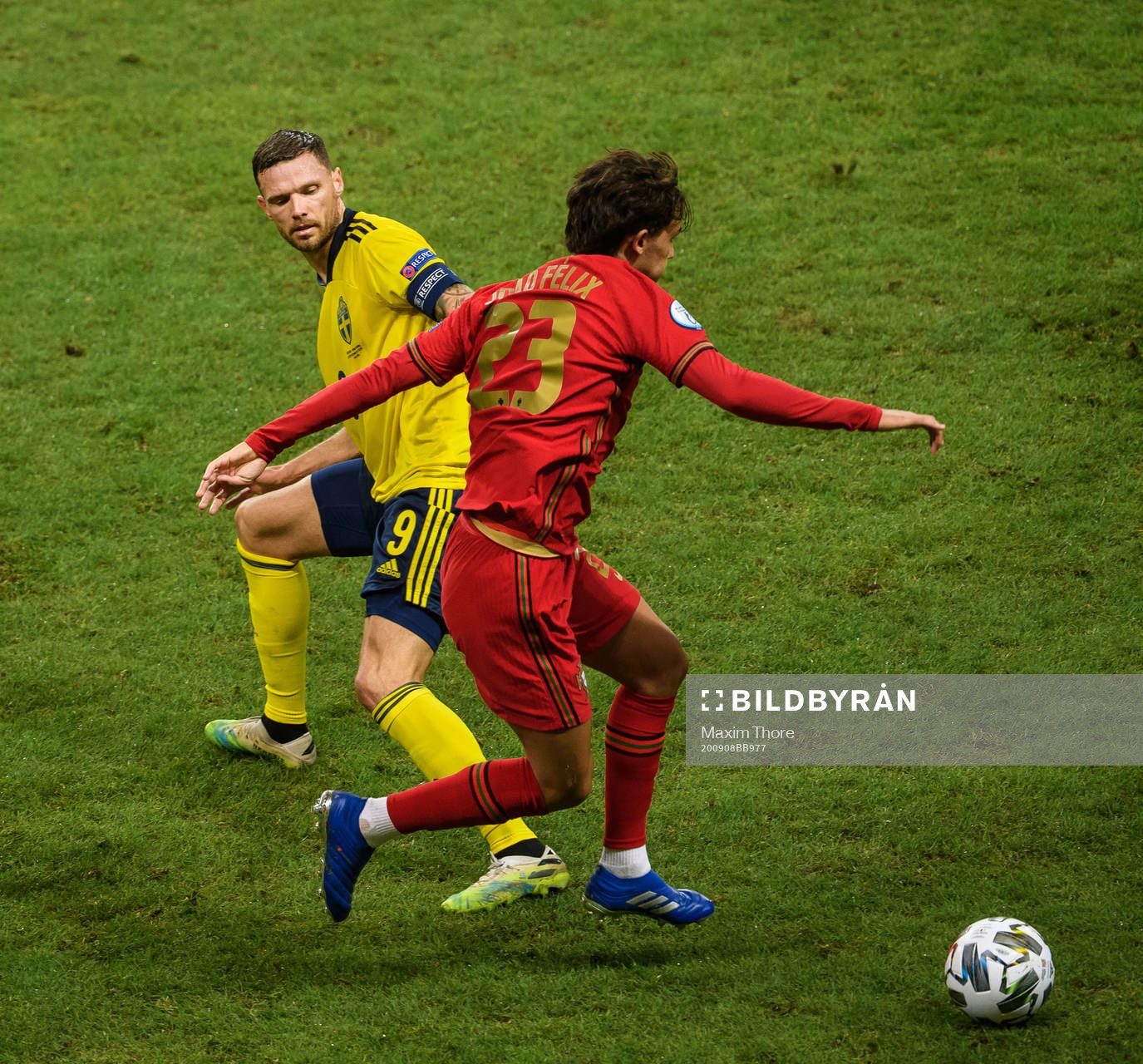 Marcus Berg of Sweden and Joao Felix of Portugal
