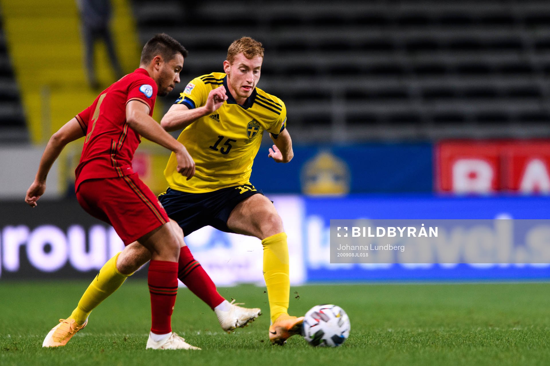Raphael Guerreiro of Portugal and Dejan Kulusevski of Sweden