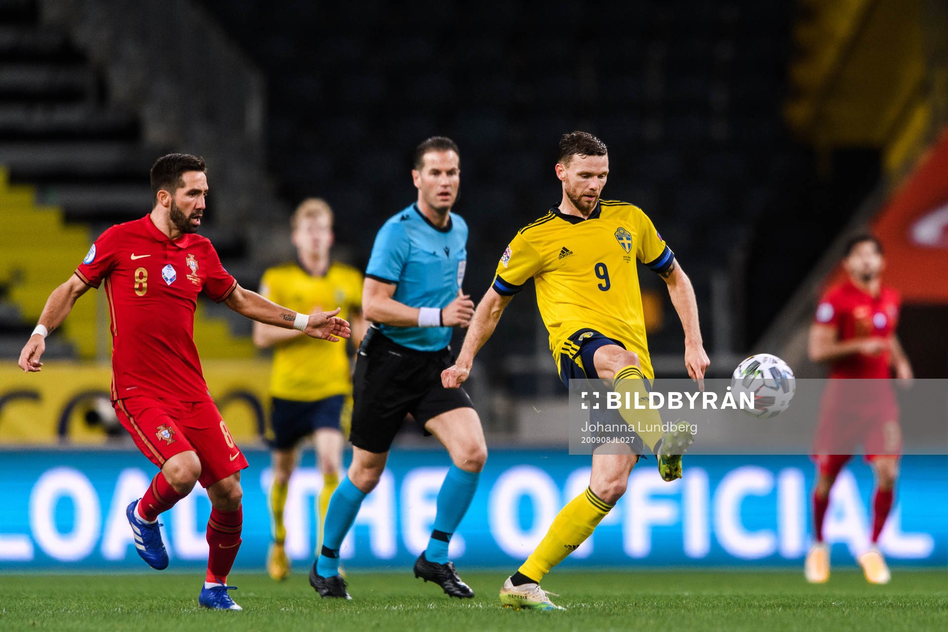 Joao Moutinho of Portugal and Marcus Berg of Sweden