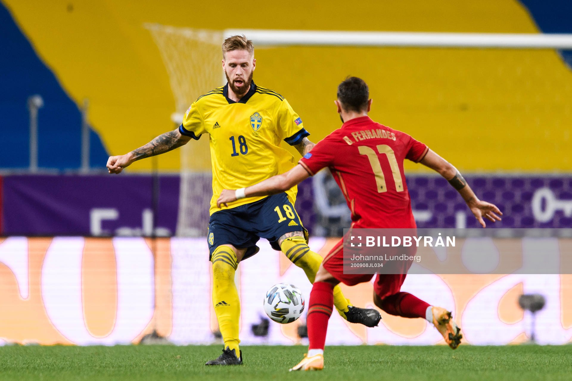 Pontus Jansson of Sweden and Bruno Fernandes of Portugal