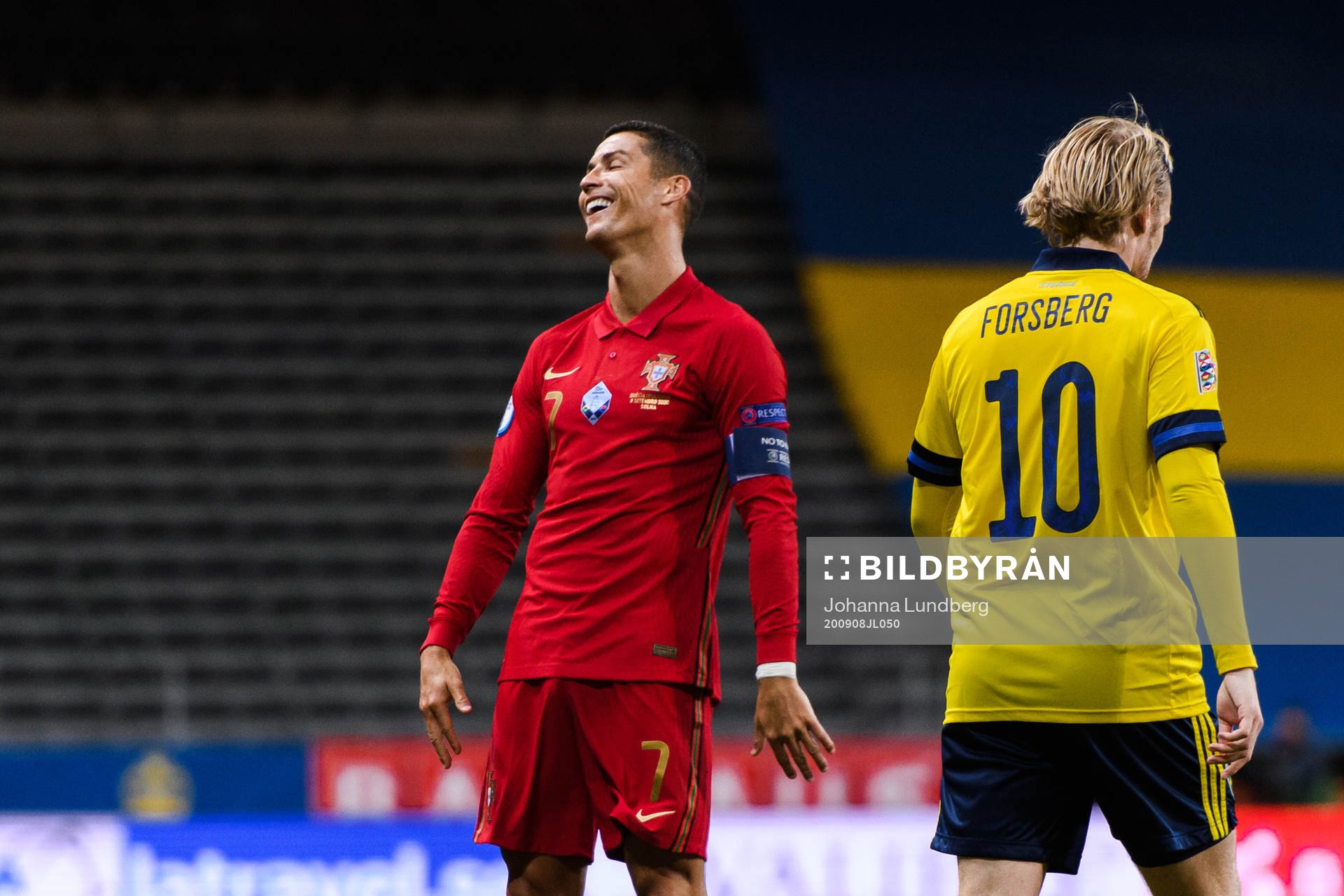 Cristiano Ronaldo of Portugal and Emil Forsberg of Sweden