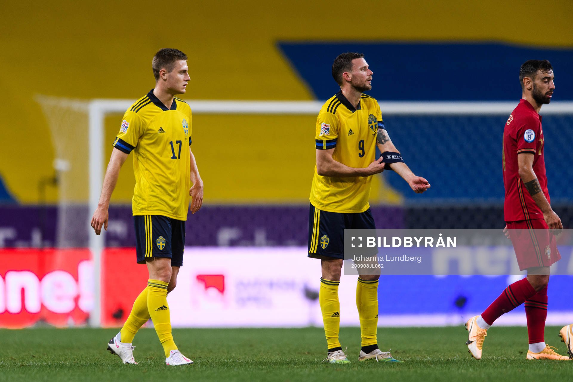 Mattias Svanberg and Marcus Berg of Sweden look dejected