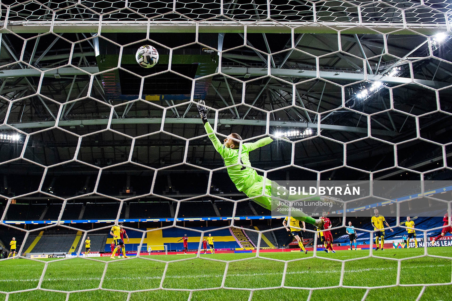Cristiano Ronaldo of Portugal scores 0-2 behind goalkeeper