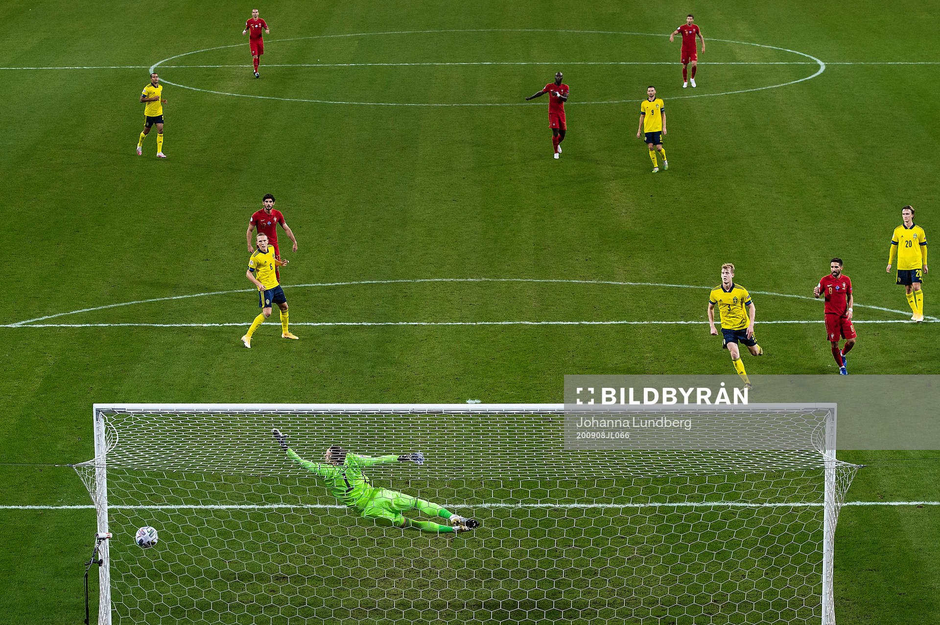 Cristiano Ronaldo of Portugal scores 0-2 behind goalkeeper