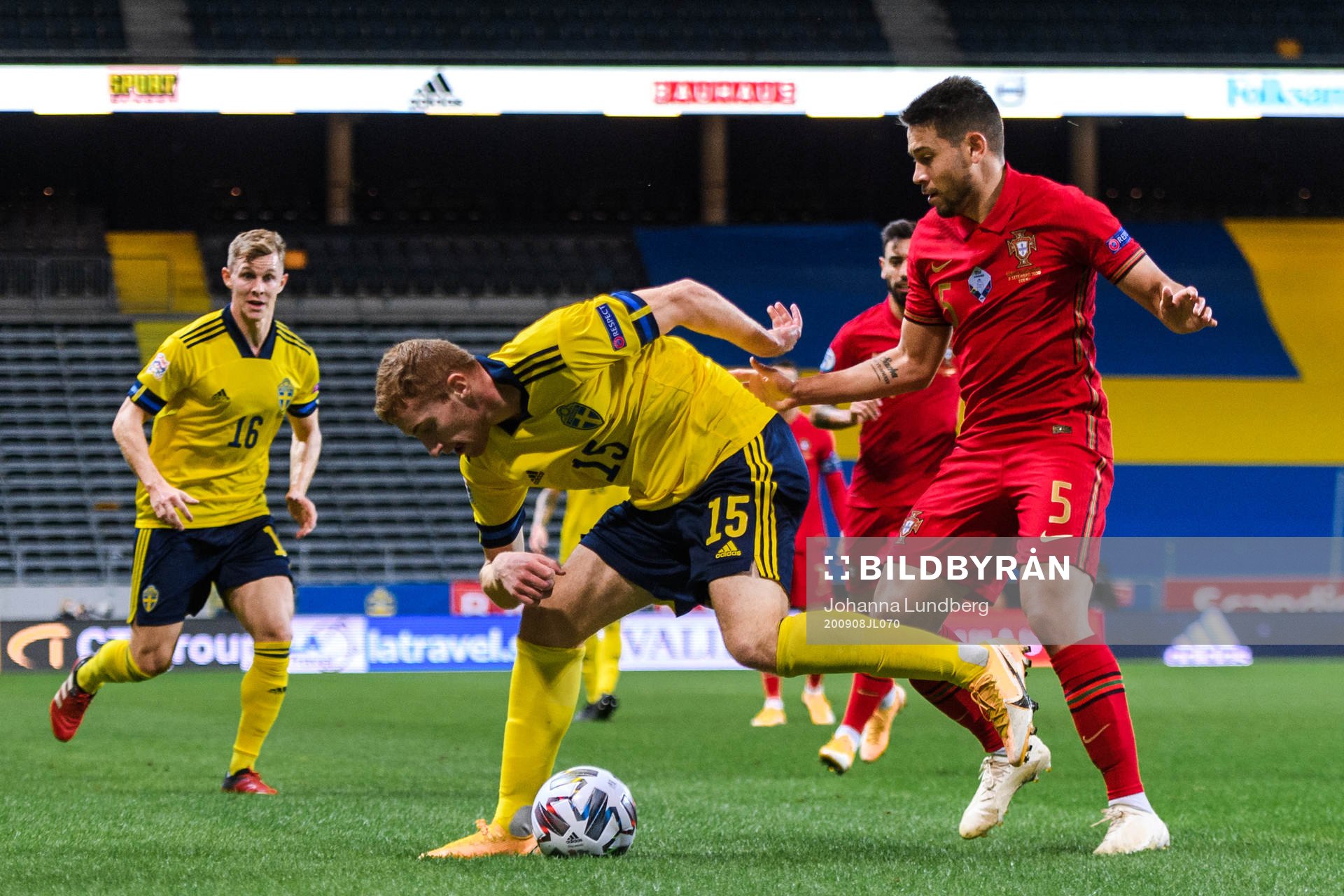 Dejan Kulusevski of Sweden and Raphael Guerreiro of Portugal