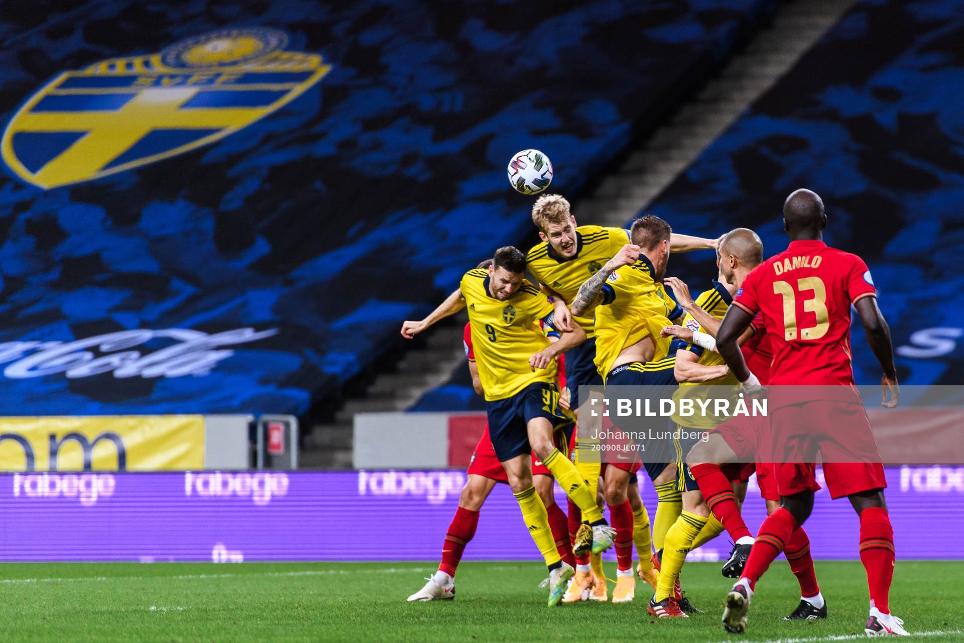 Marcus Berg and Filip Helander of Sweden