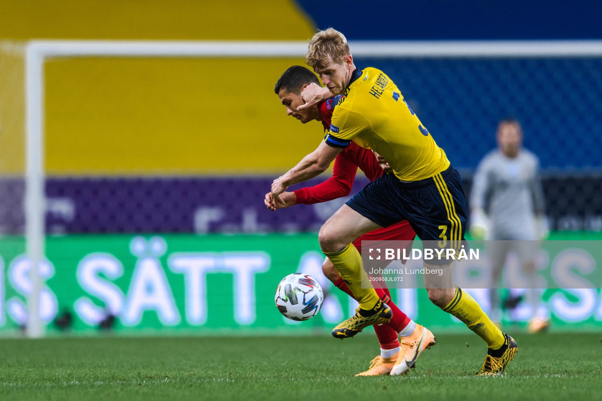 Filip Helander of Sweden and Cristiano Ronaldo of Portugal