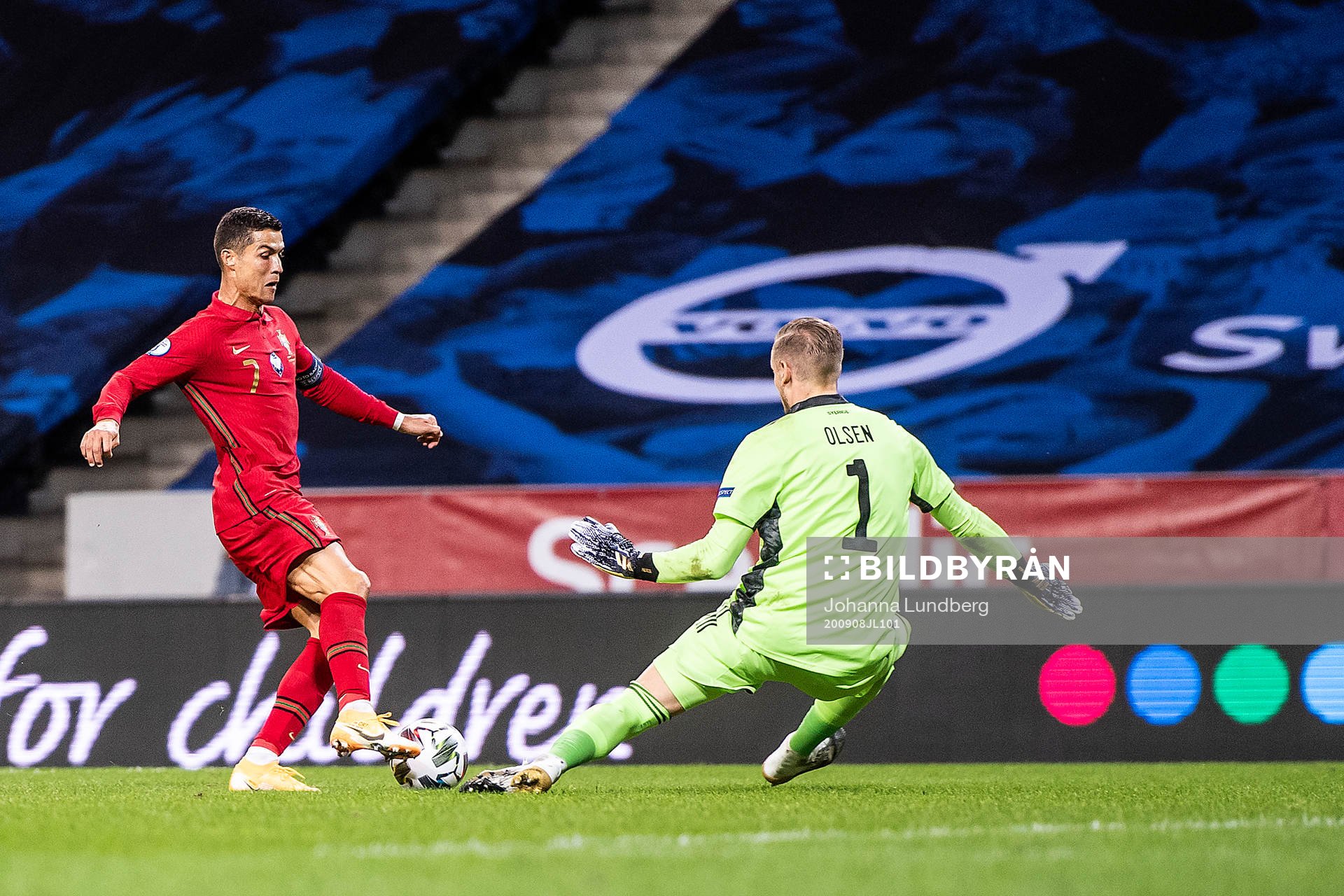 Cristiano Ronaldo of Portugal and goalkeeper Robin Olsen of
