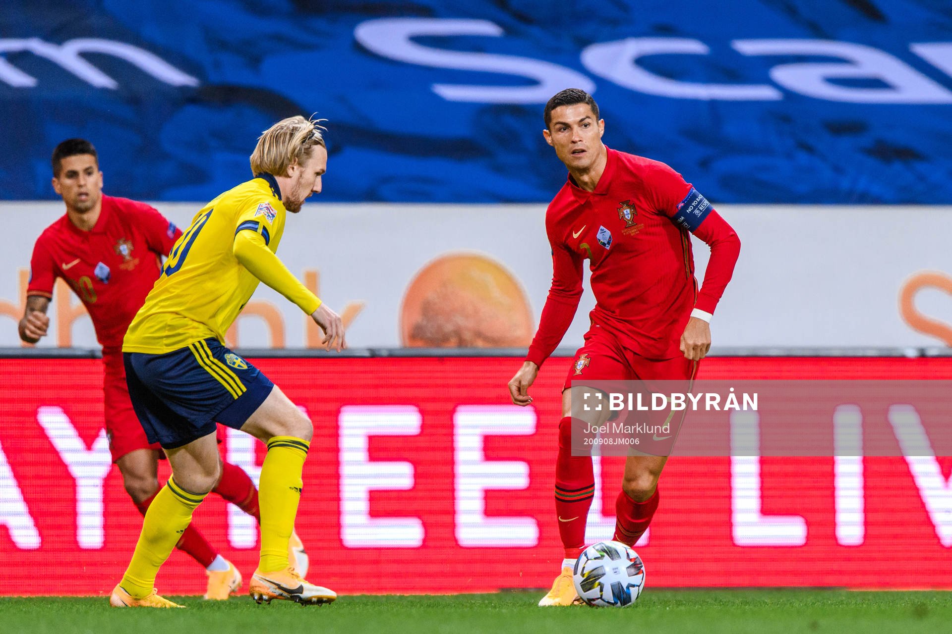 Emil Forsberg of Sweden and Cristiano Ronaldo of Portugal