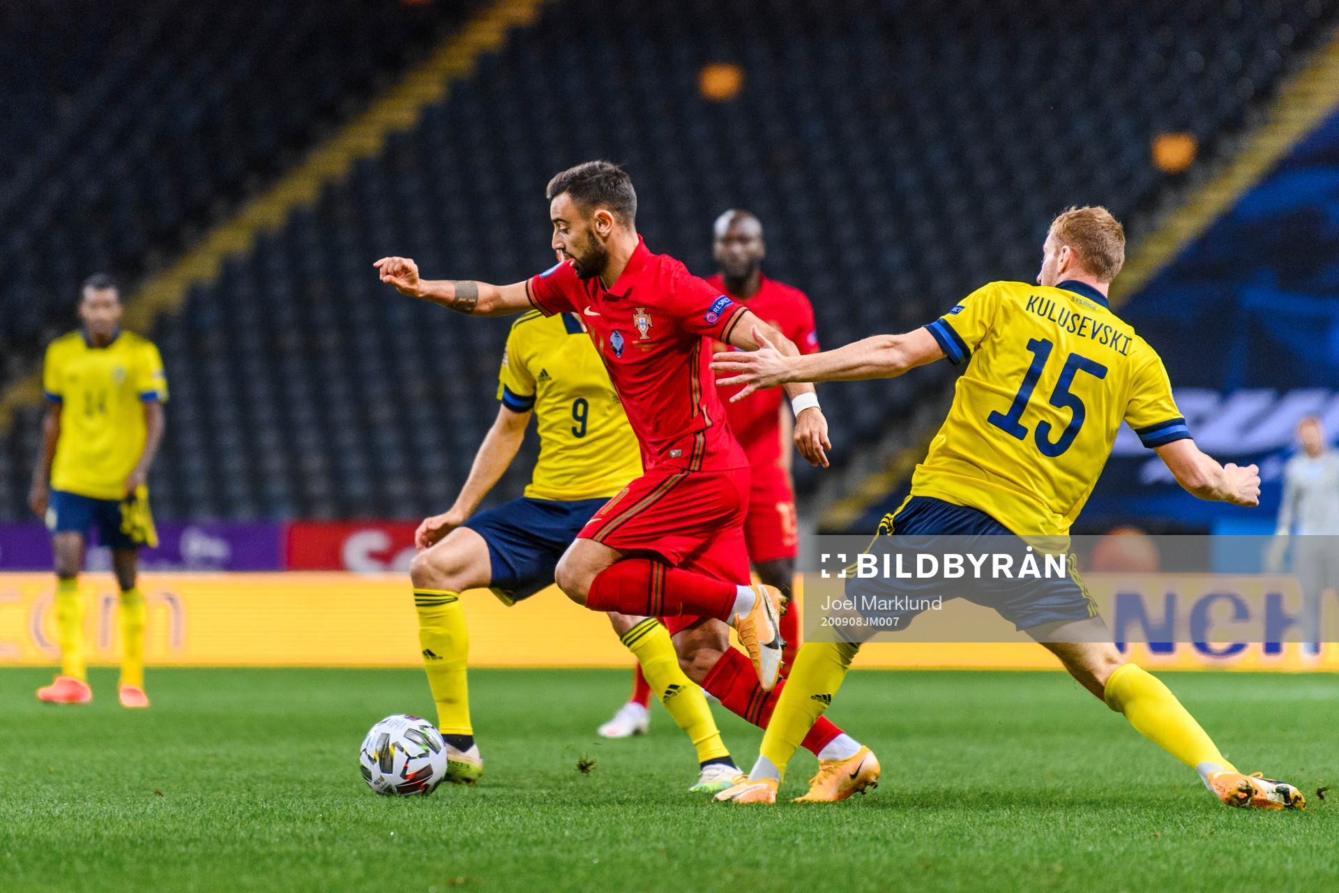 Bruno Fernandes of Portugal and Dejan Kulusevski of Sweden