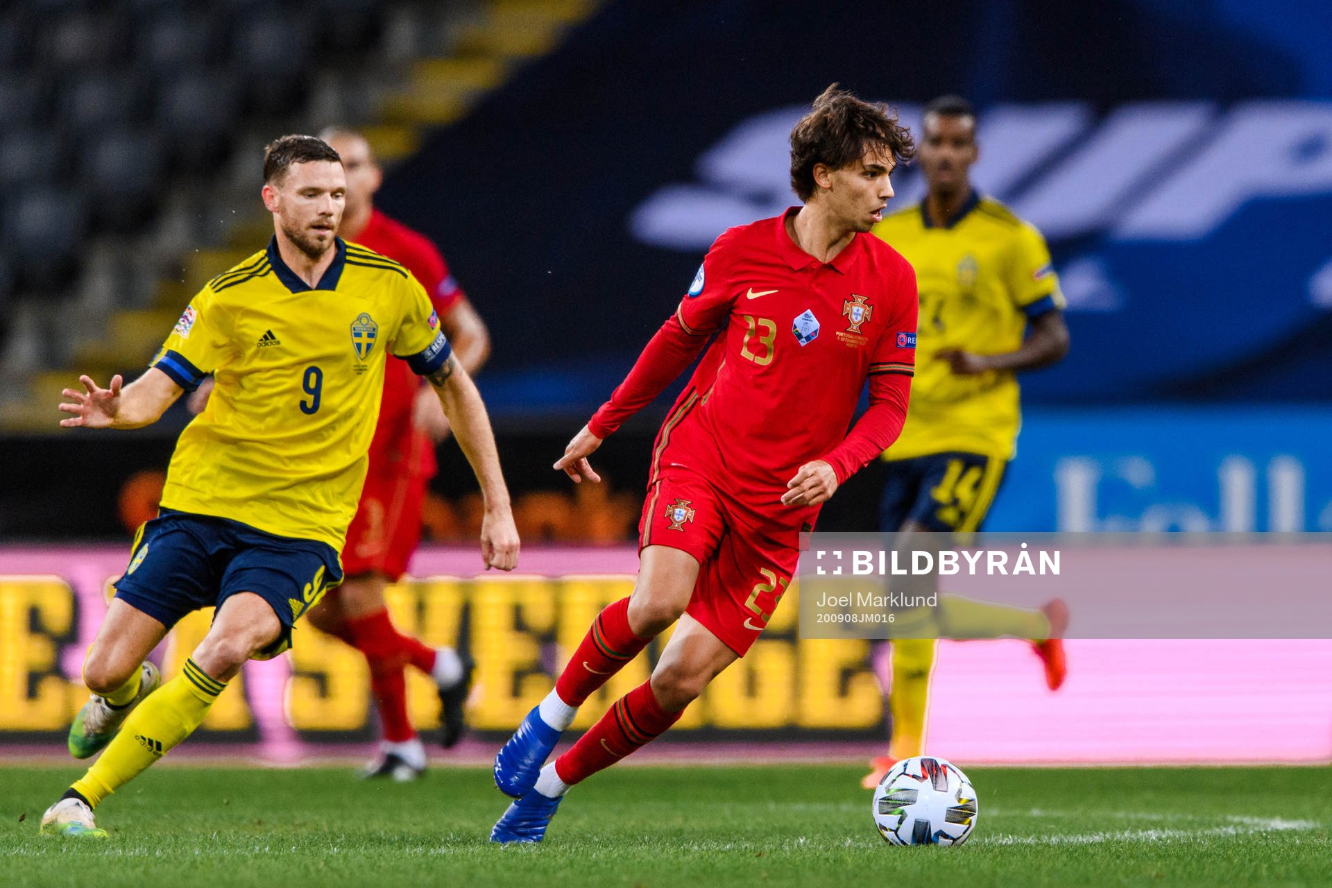 Marcus Berg of Sweden and Joao Felix of Portugal