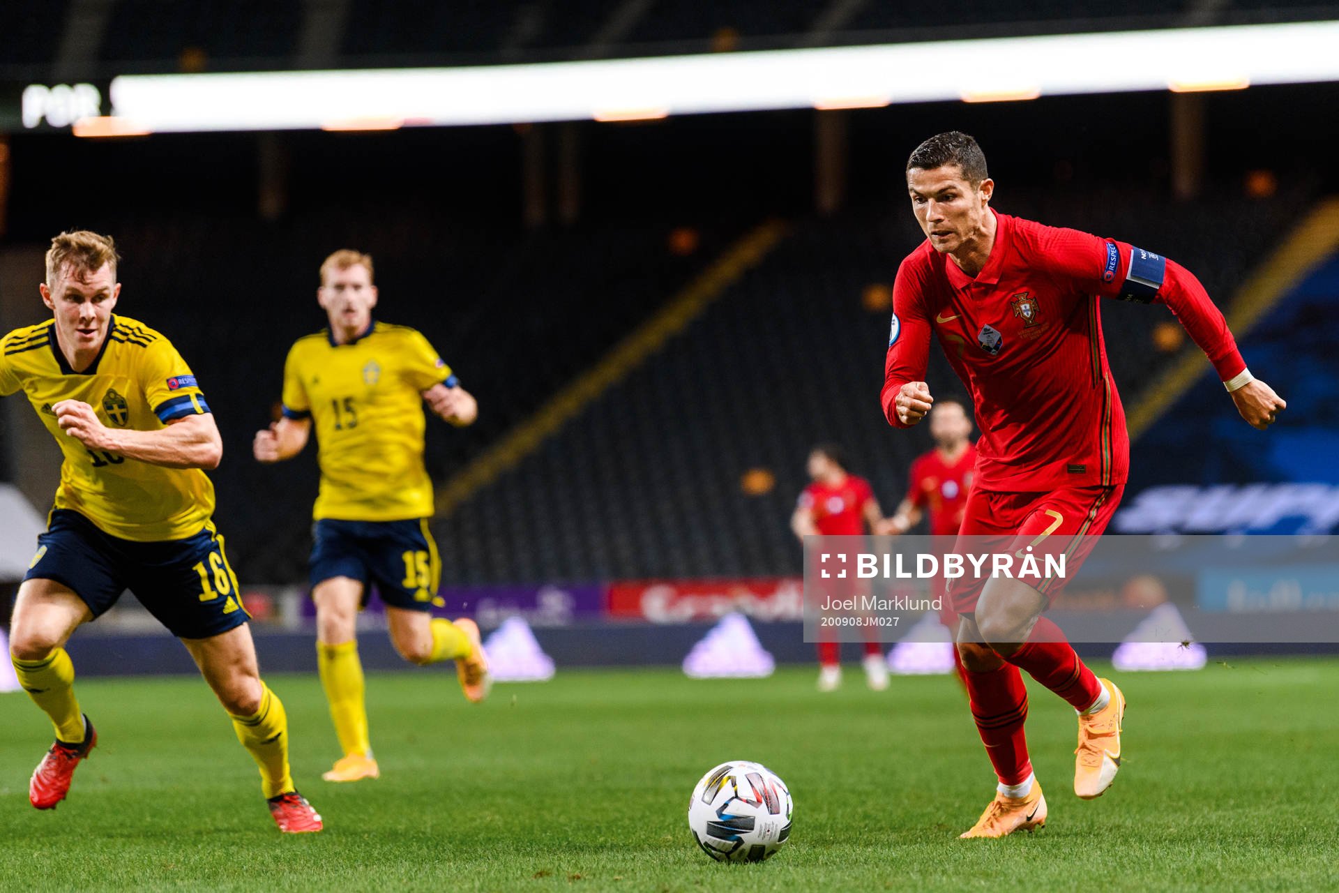Emil Krafth of Sweden and Cristiano Ronaldo of Portugal