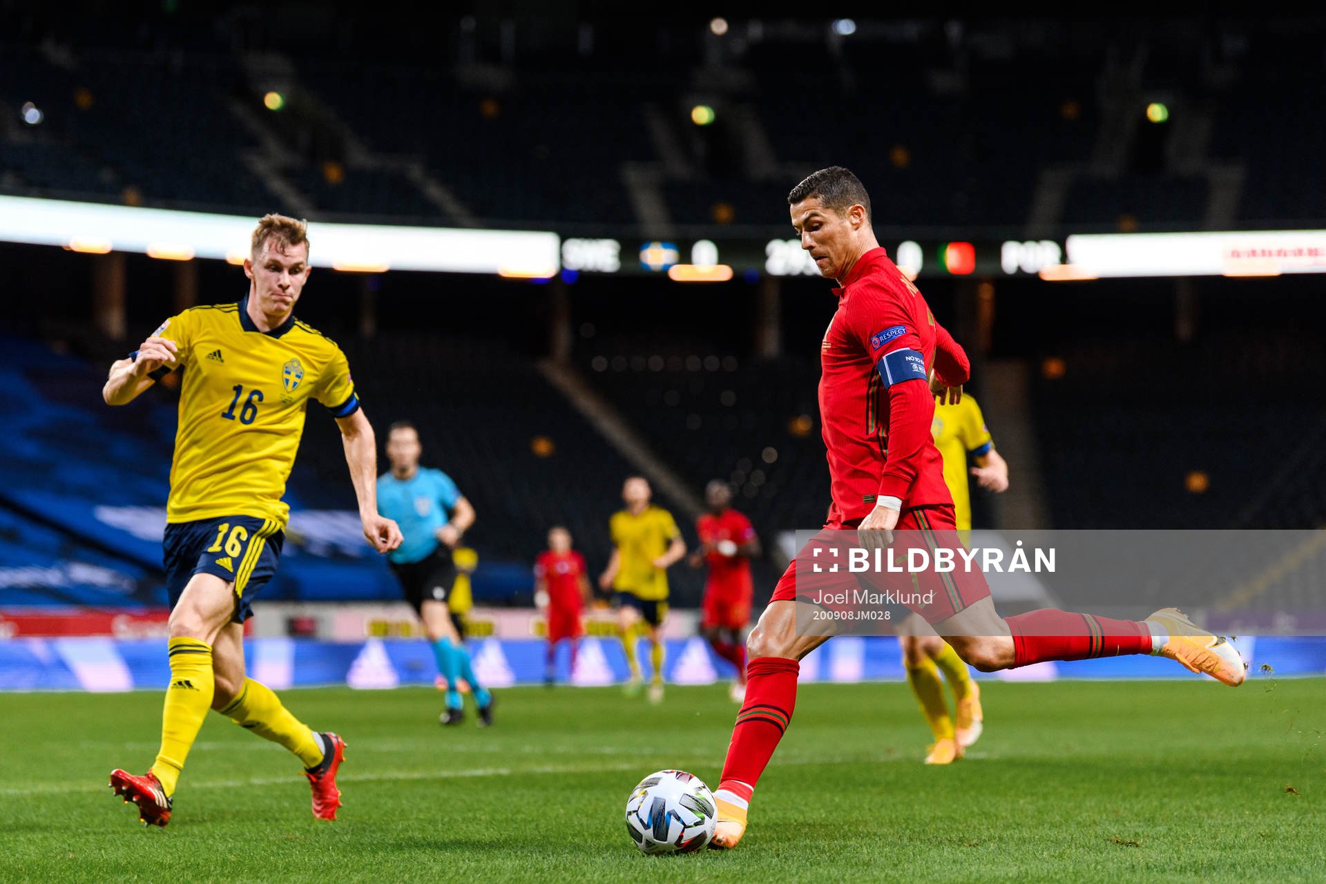 Emil Krafth of Sweden and Cristiano Ronaldo of Portugal