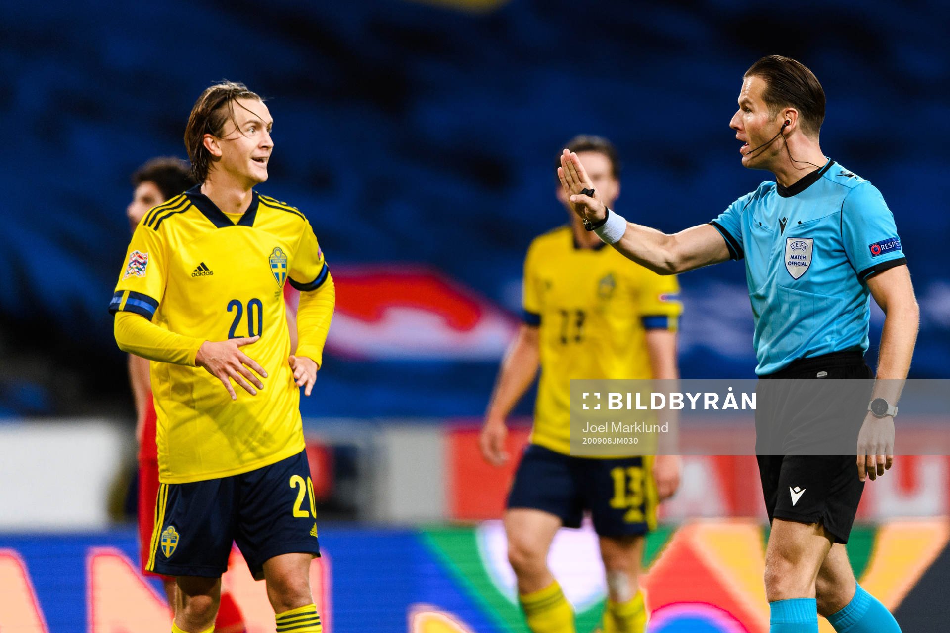 Kristoffer Olsson of Sweden and referee Danny Makkelie