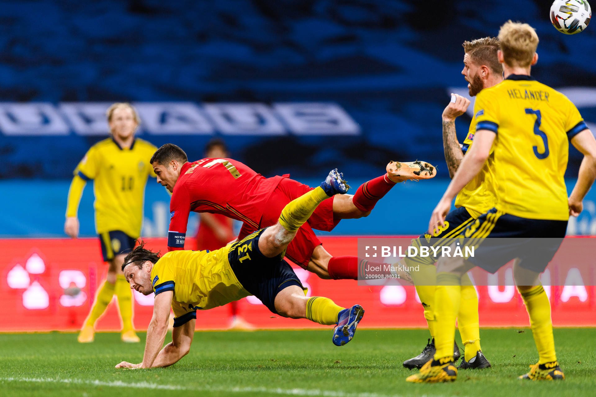 Gustav Svensson of Sweden and Cristiano Ronaldo of Portugal