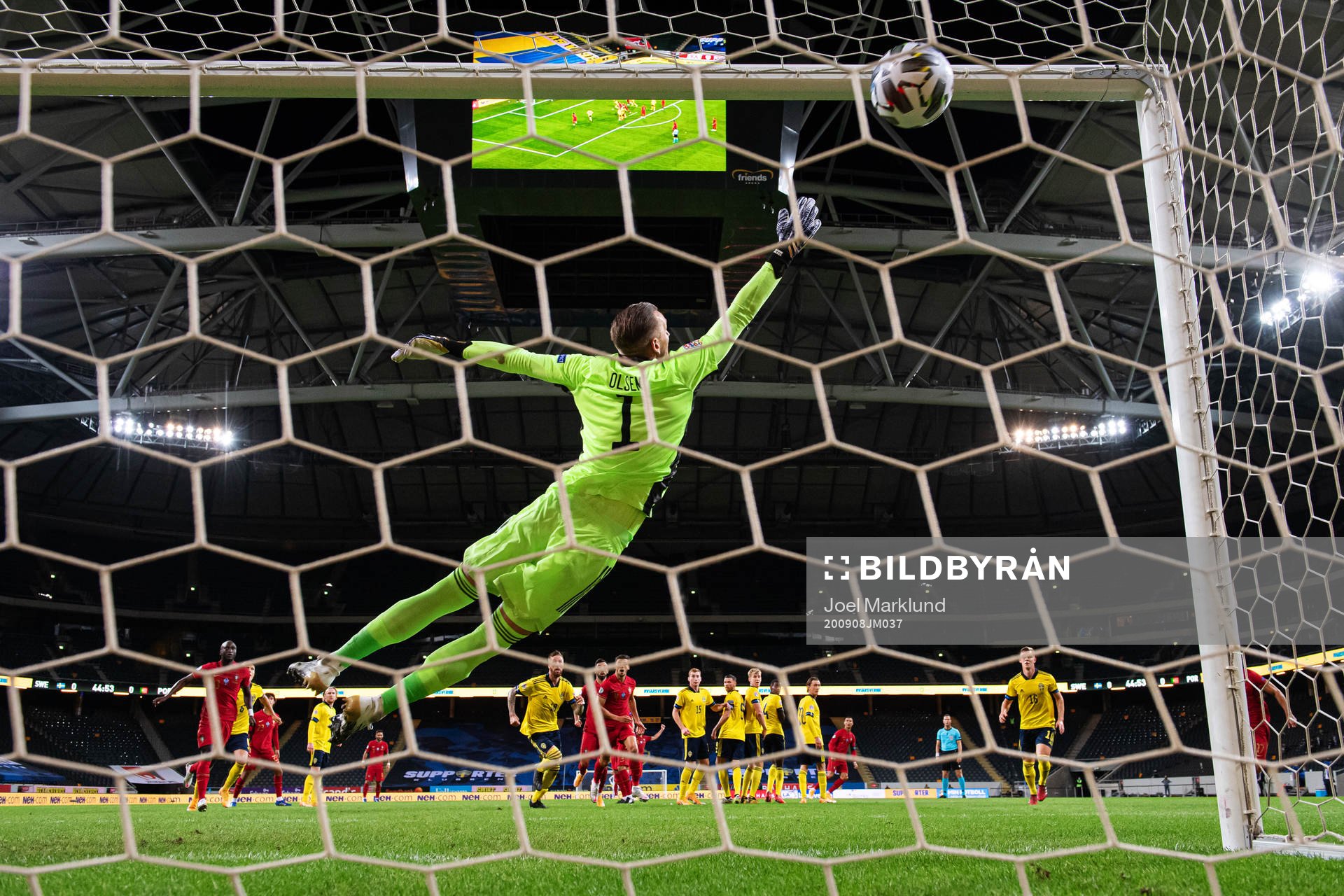 Goalkeeper Robin Olsen of Sweden lets in the 0-1 goal from