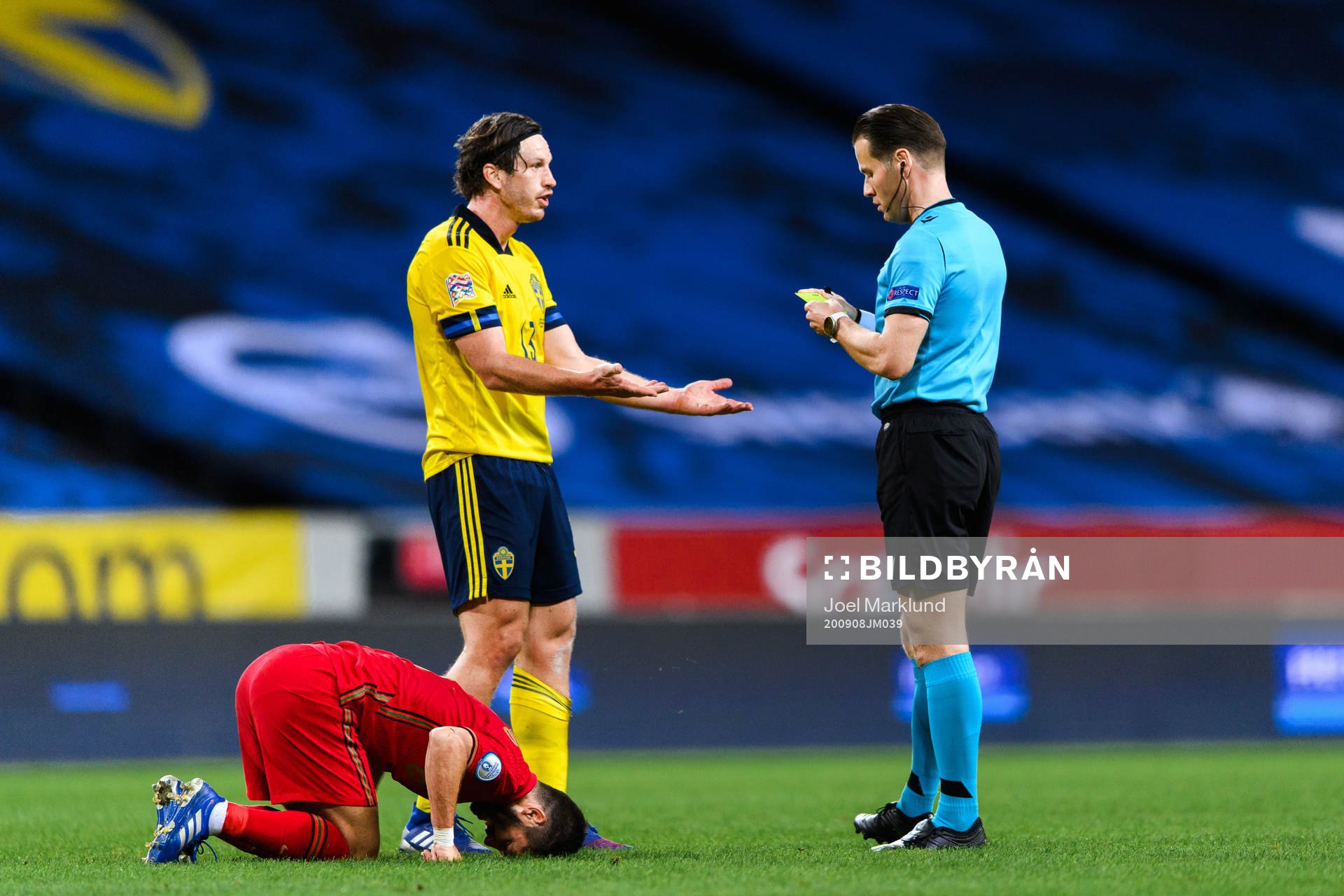 Gustav Svensson of Sweden receives his second yellow card