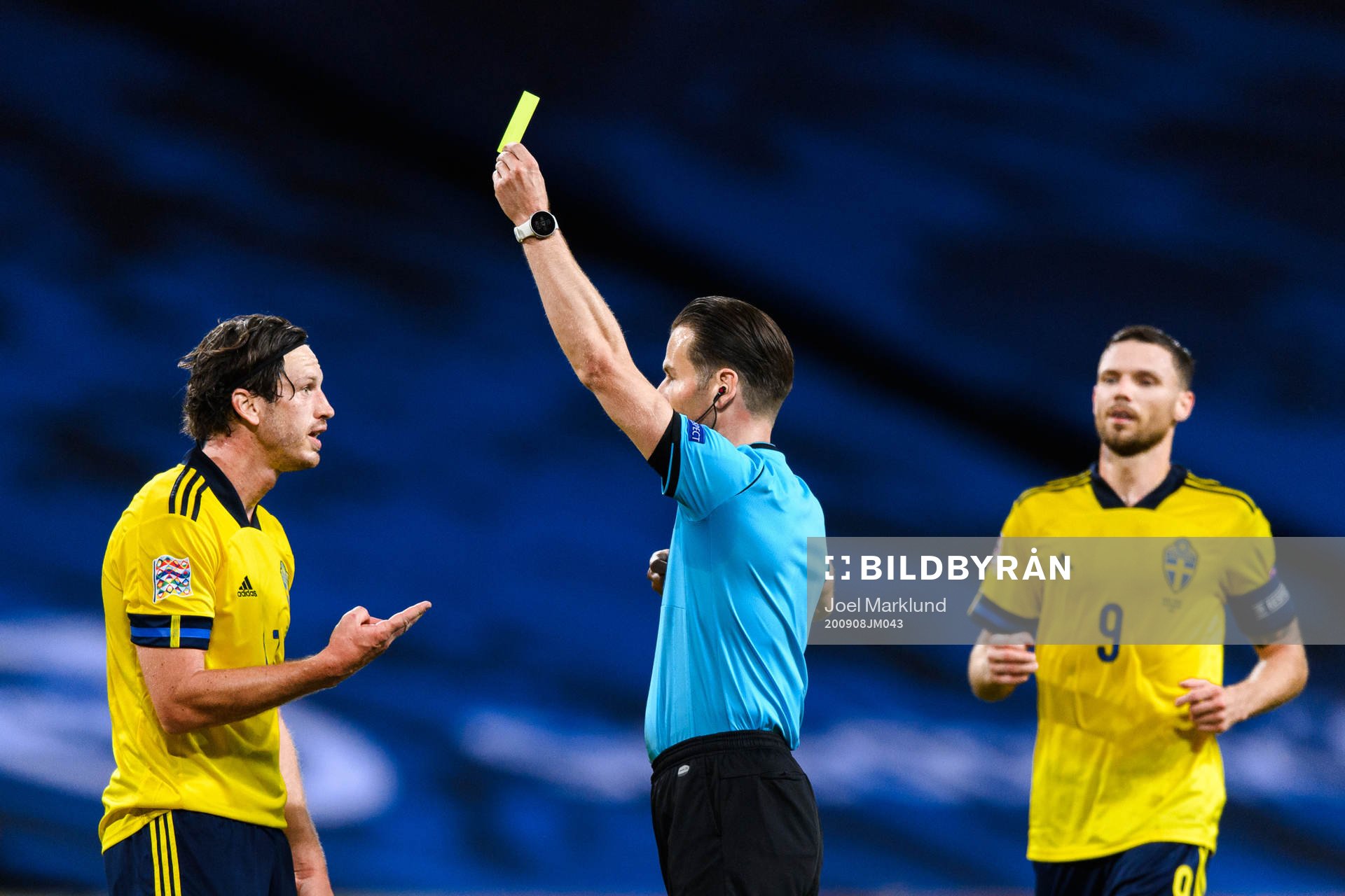Gustav Svensson of Sweden receives his second yellow card