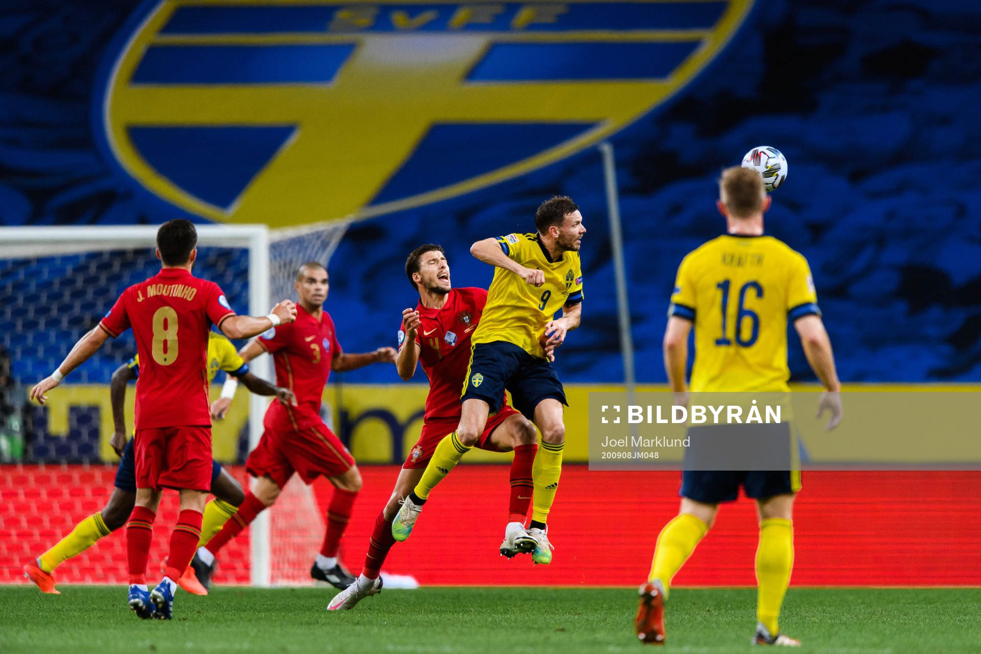 Ruben Dias of Portugal and Marcus Berg of Sweden