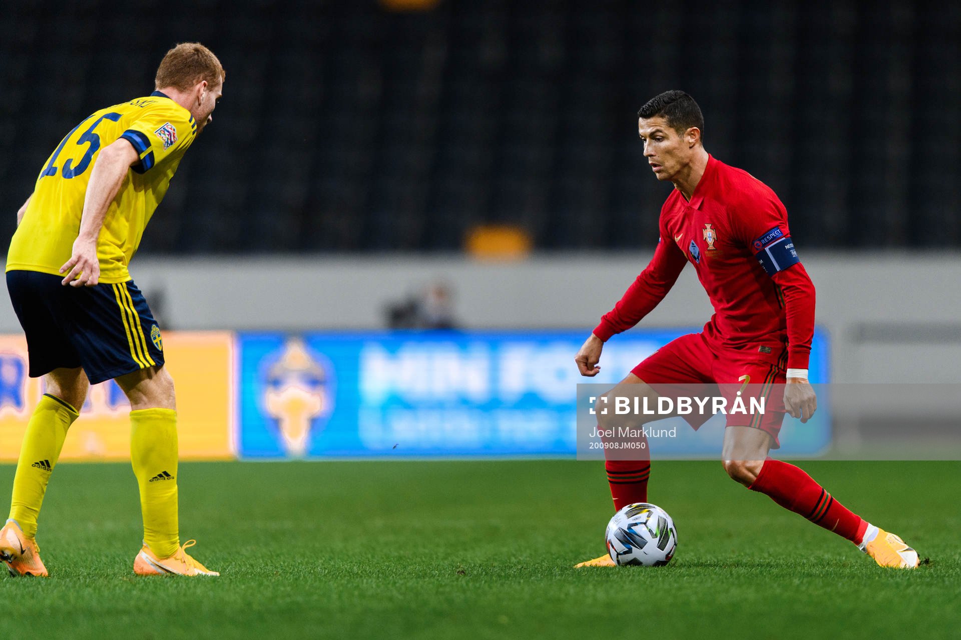 Dejan Kulusevski of Sweden and Cristiano Ronaldo of Portugal