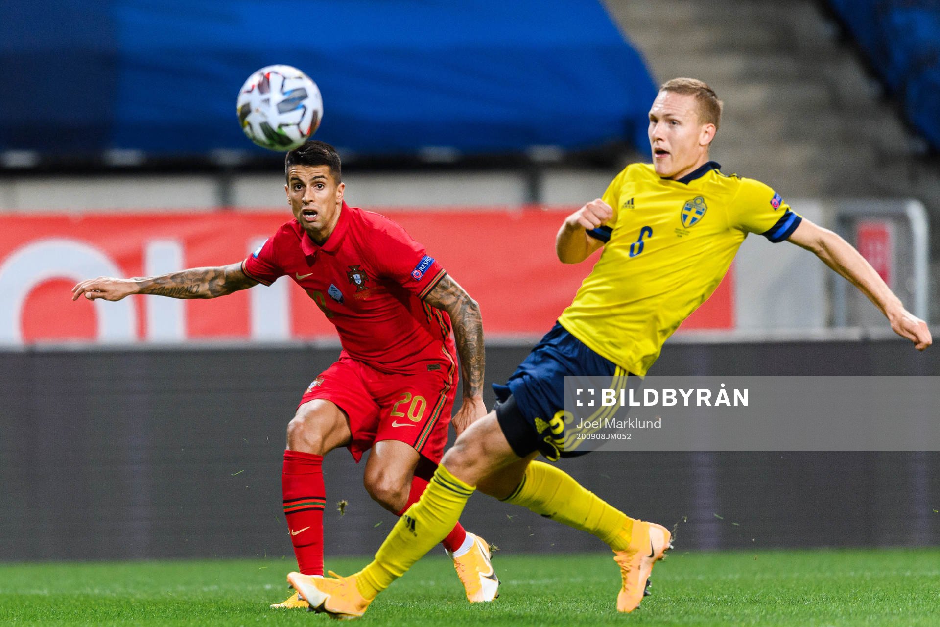 Joao Cancelo of Portugal and Ludwig Augustinsson of Sweden