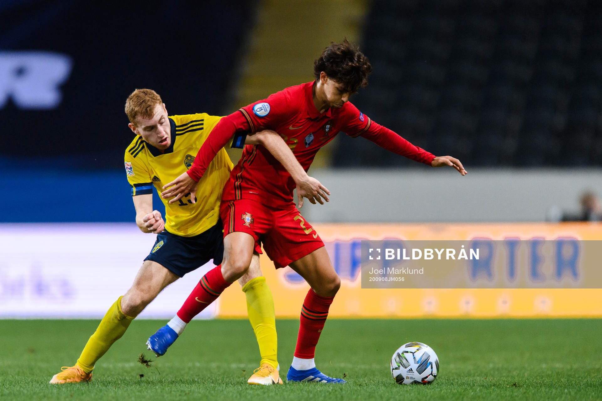 Dejan Kulusevski of Sweden and Joao Felix of Portugal