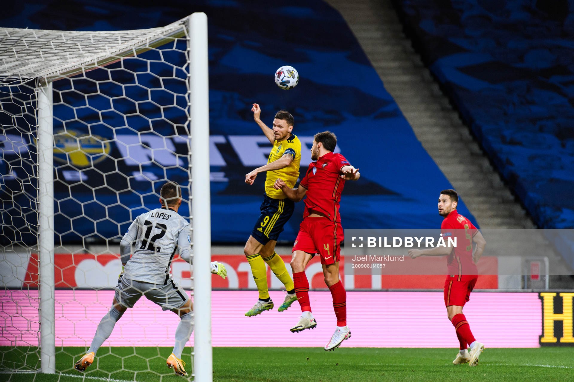 Marcus Berg of Sweden against goalkeeper Anthony Lopes and Ruben Dias of Portugal during the Nations League football match between Sweden and Portugal on September 8, 2020 in Stockholm.