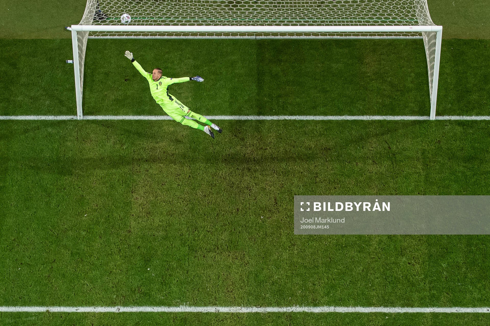 Goalkeeper Robin Olsen of Sweden lets in the 0-1 goal from