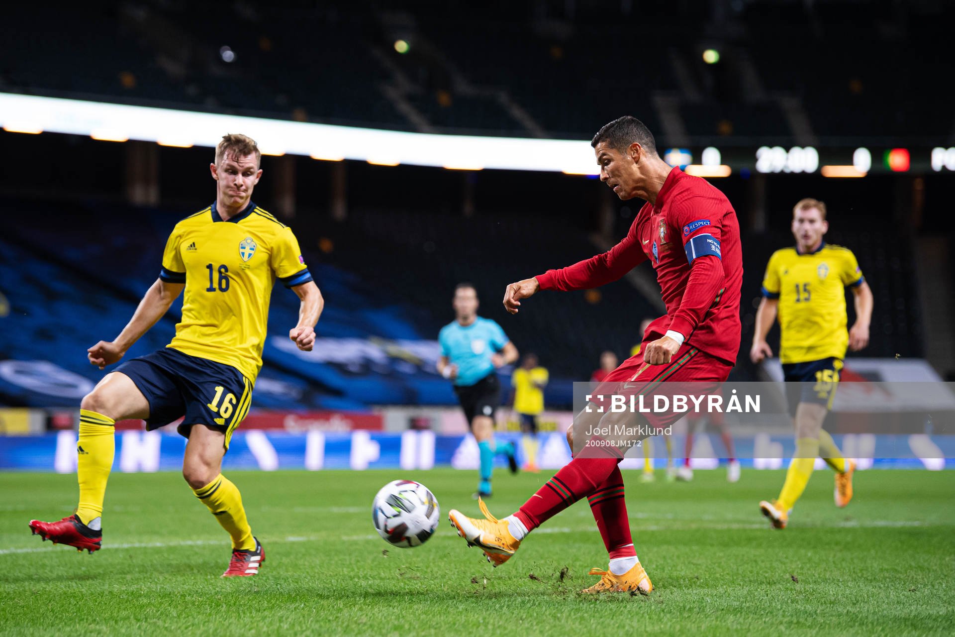 Emil Krafth of Sweden and Cristiano Ronaldo of Portugal