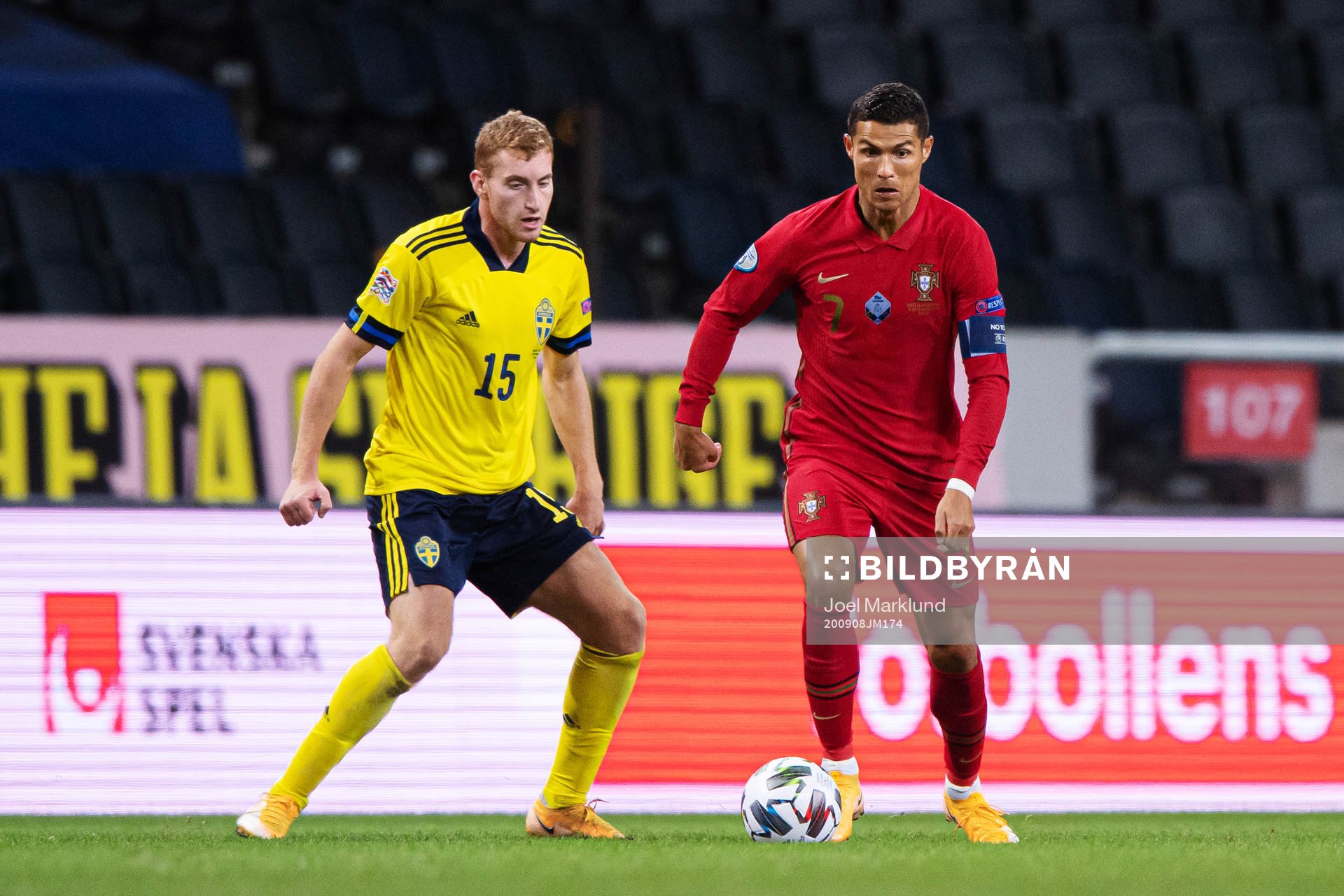Dejan Kulusevski of Sweden and Cristiano Ronaldo of Portugal