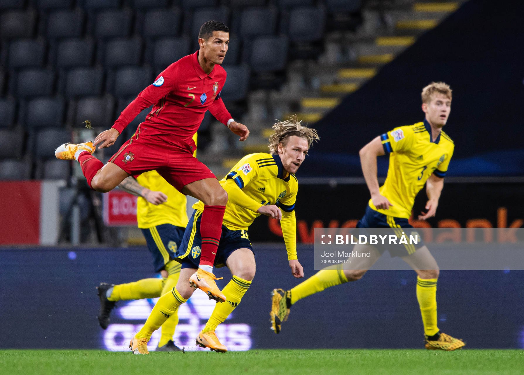 Cristiano Ronaldo of Portugal and Emil Forsberg of Sweden