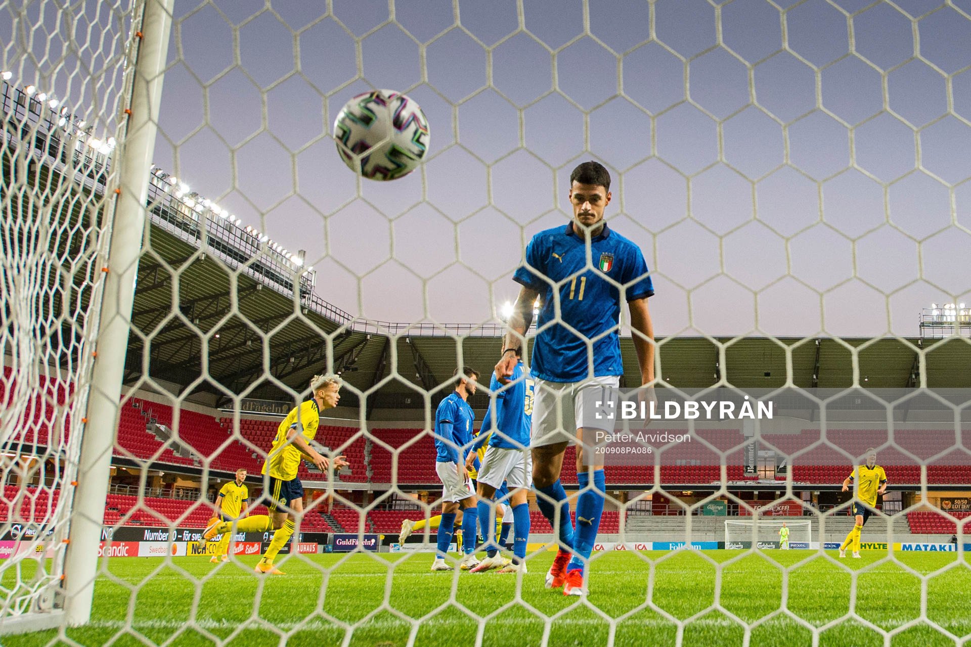 Gianluca Scamacca of Italy looks dejected