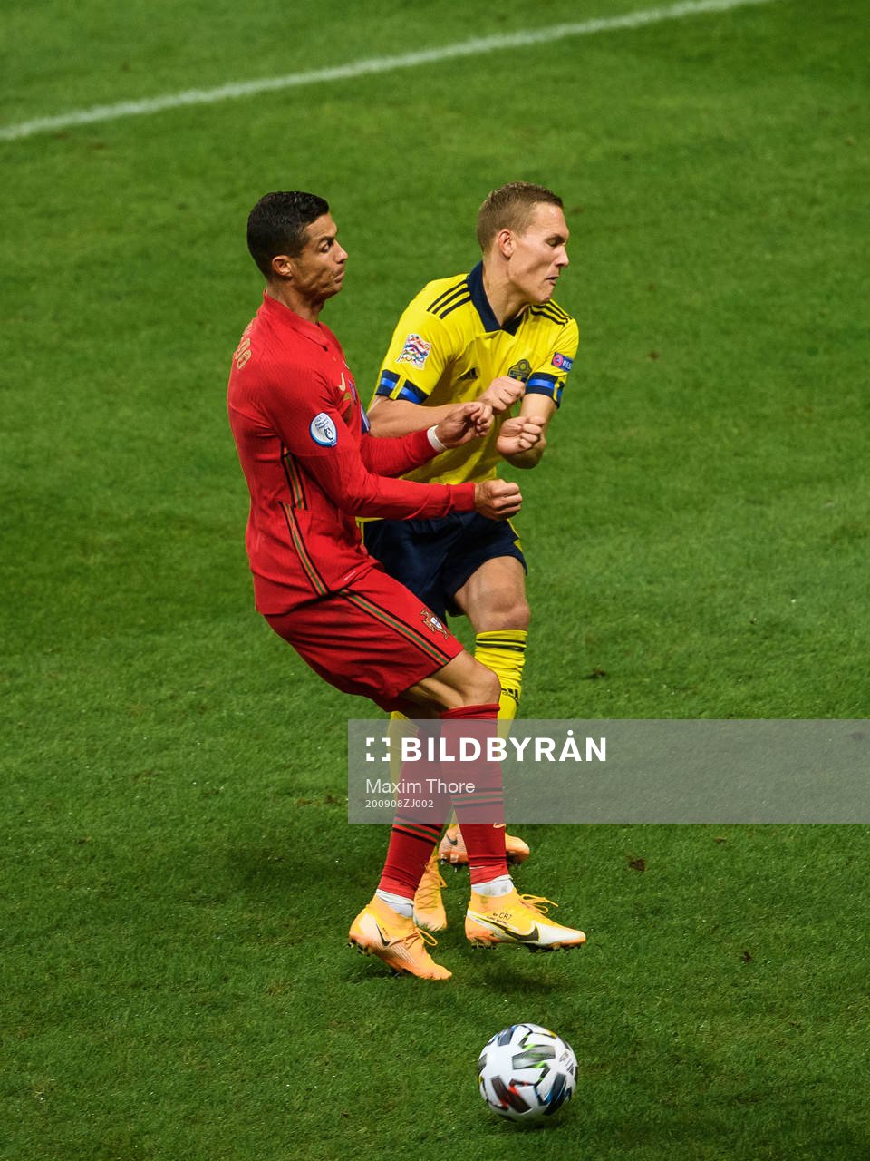 Cristiano Ronaldo of Portugal and Ludwig Augustinsson of